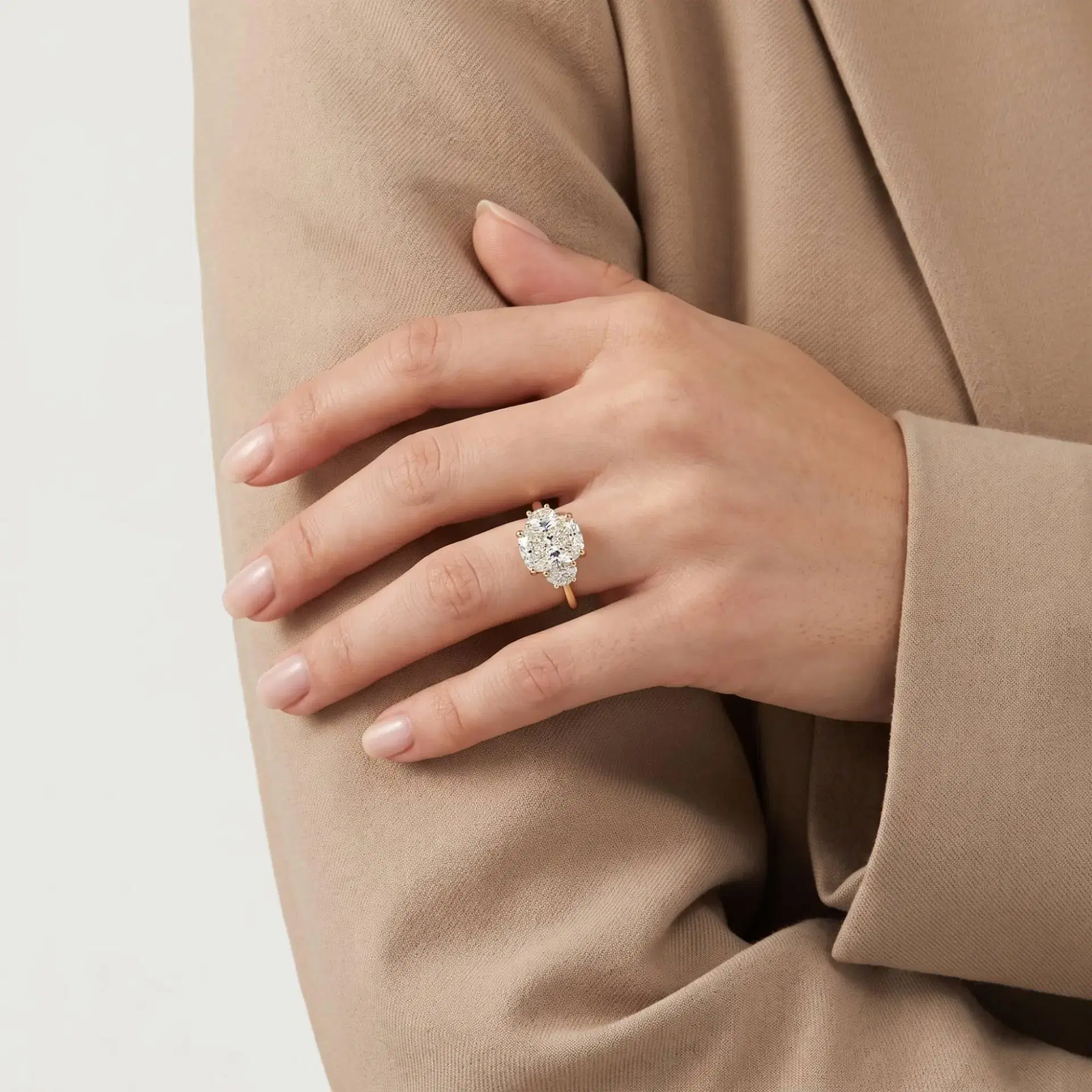 Elongated Cushion & Half Moon Diamond Three Stone Ring on model