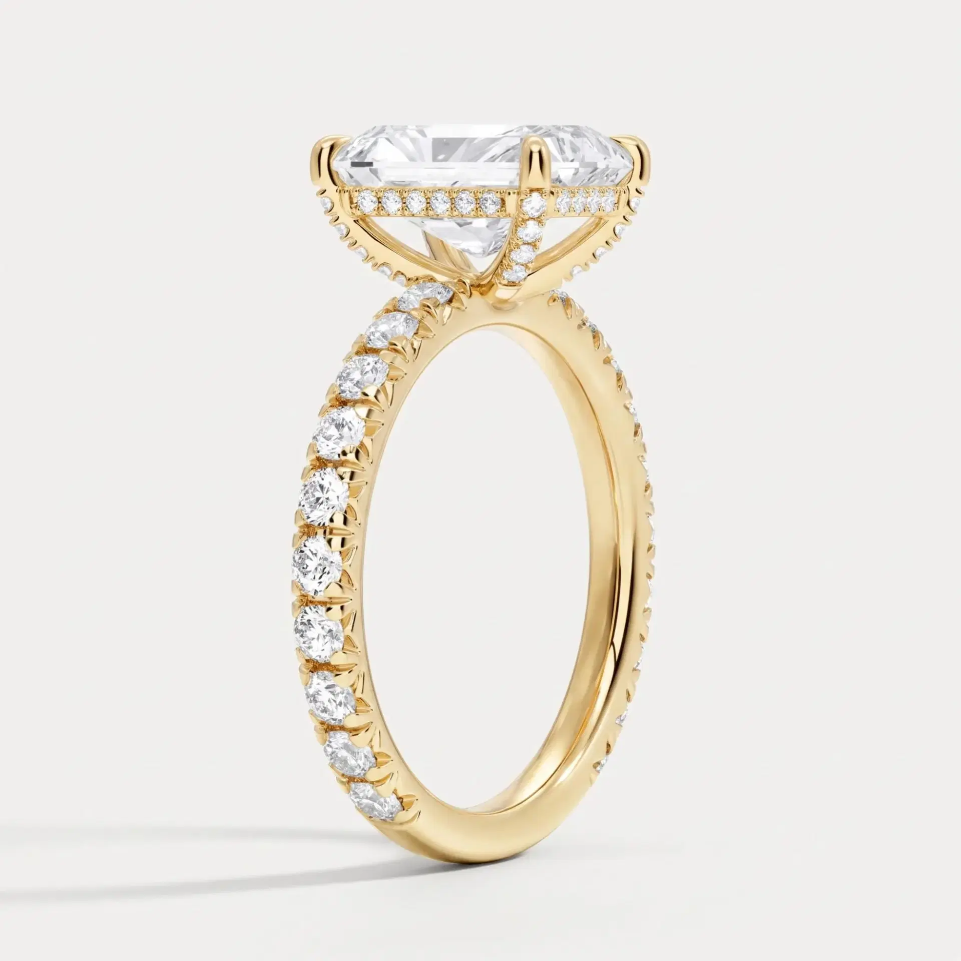 Radiant Cut Diamond Hidden Halo Ring with Pavé Shank on model