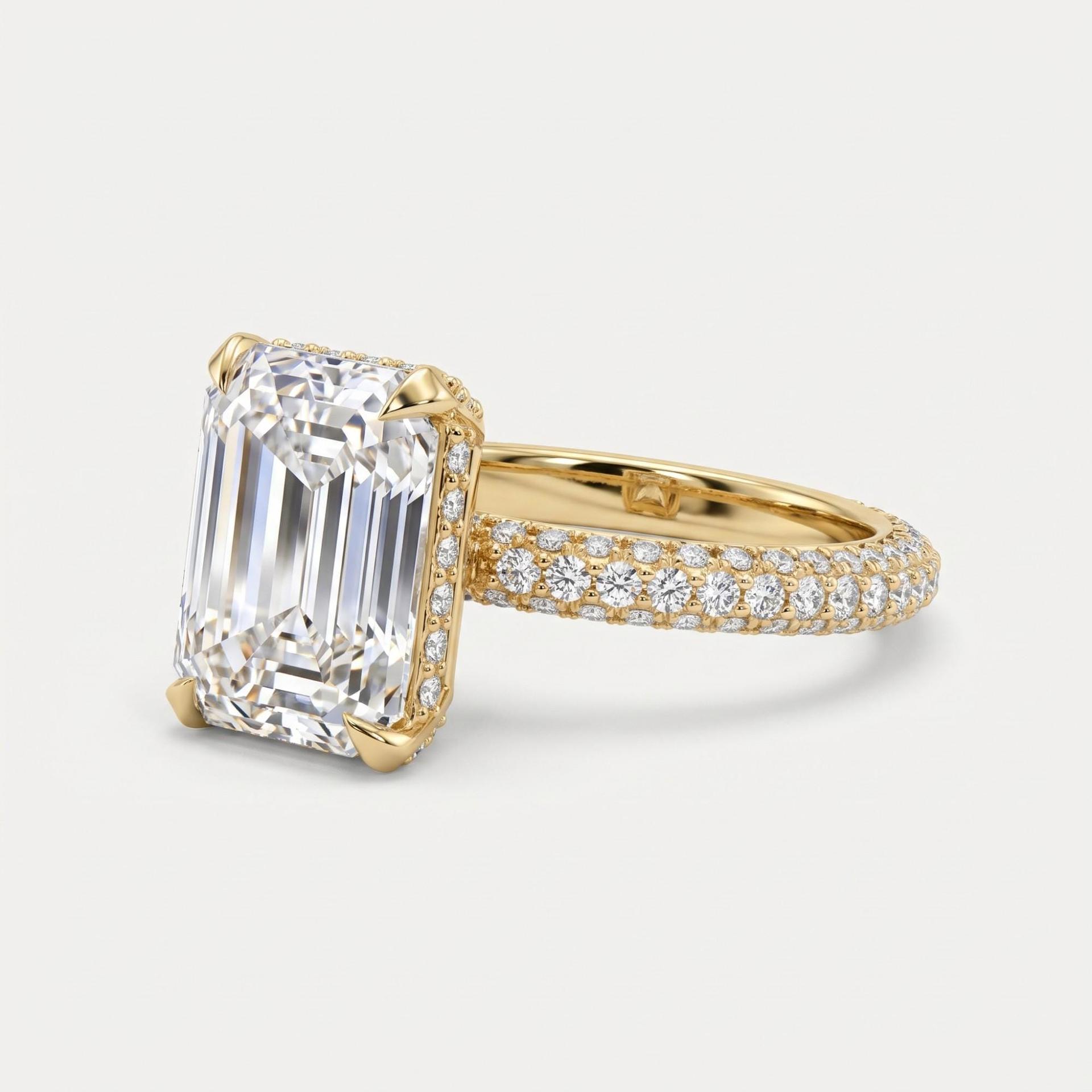 Emerald Cut Diamond Ring with Hidden Halo Pavé Shank on model