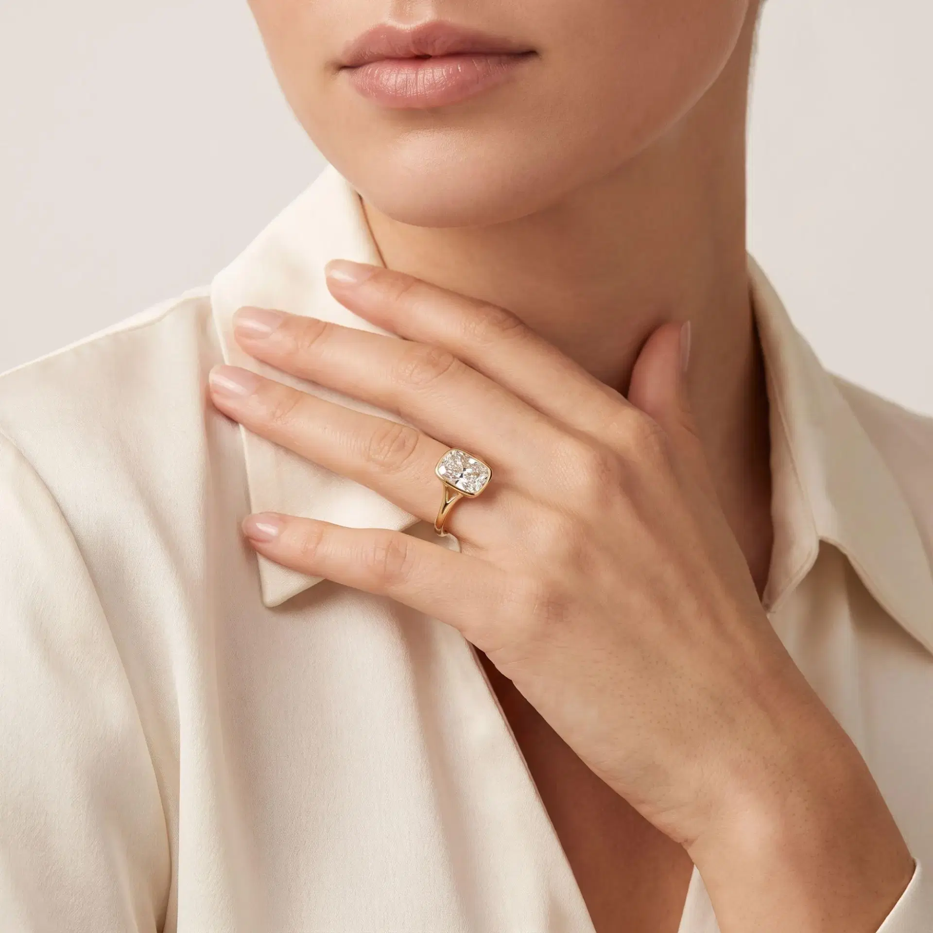 Elongated Cushion Diamond Bezel Solitaire Ring on model