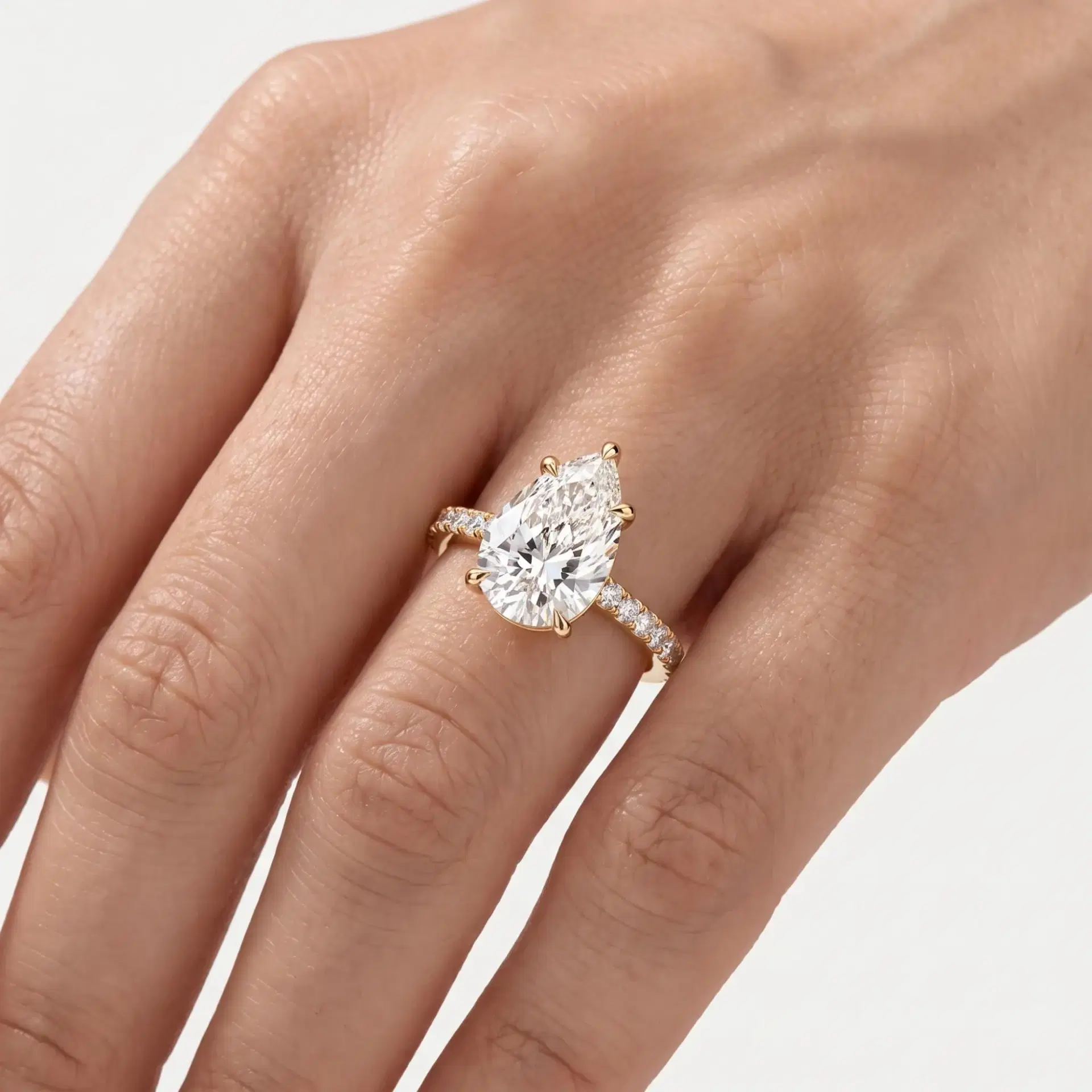 Pear Diamond Five Prong Ring with Pavé Band on model