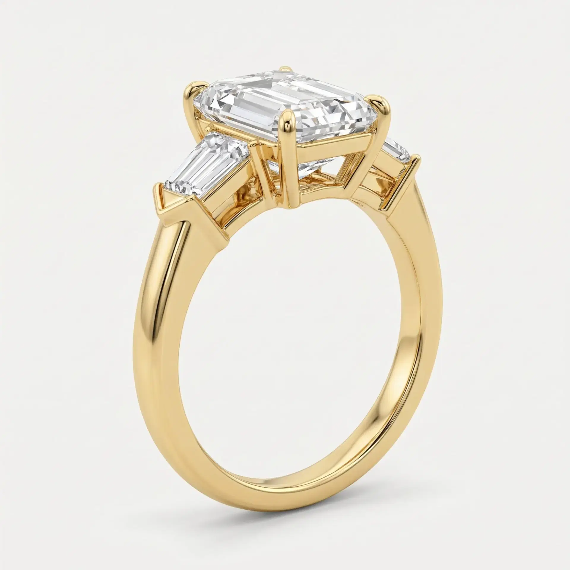 Tapered Baguette and Emerald Cut Diamond Ring on model