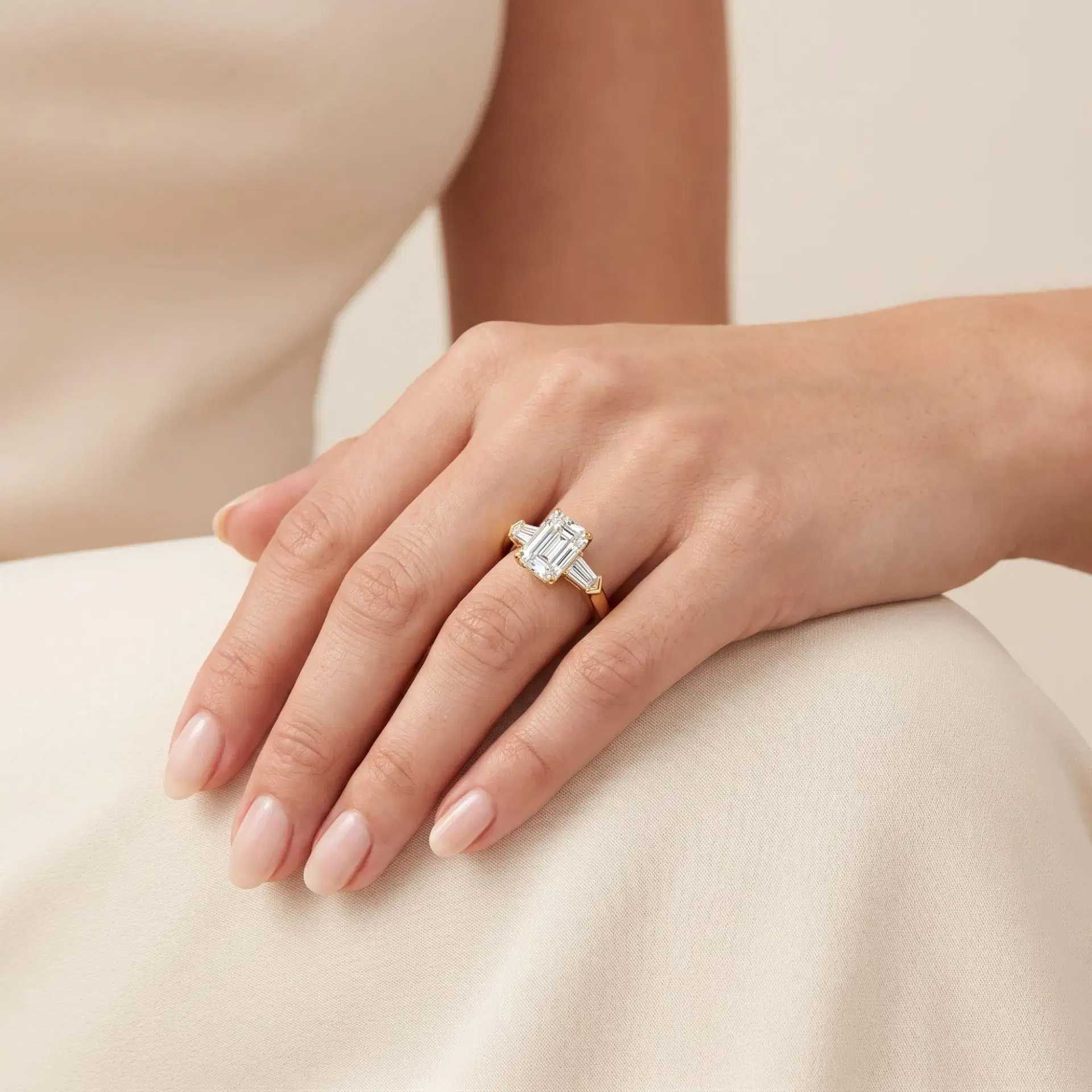 Tapered Baguette and Emerald Cut Diamond Ring on model