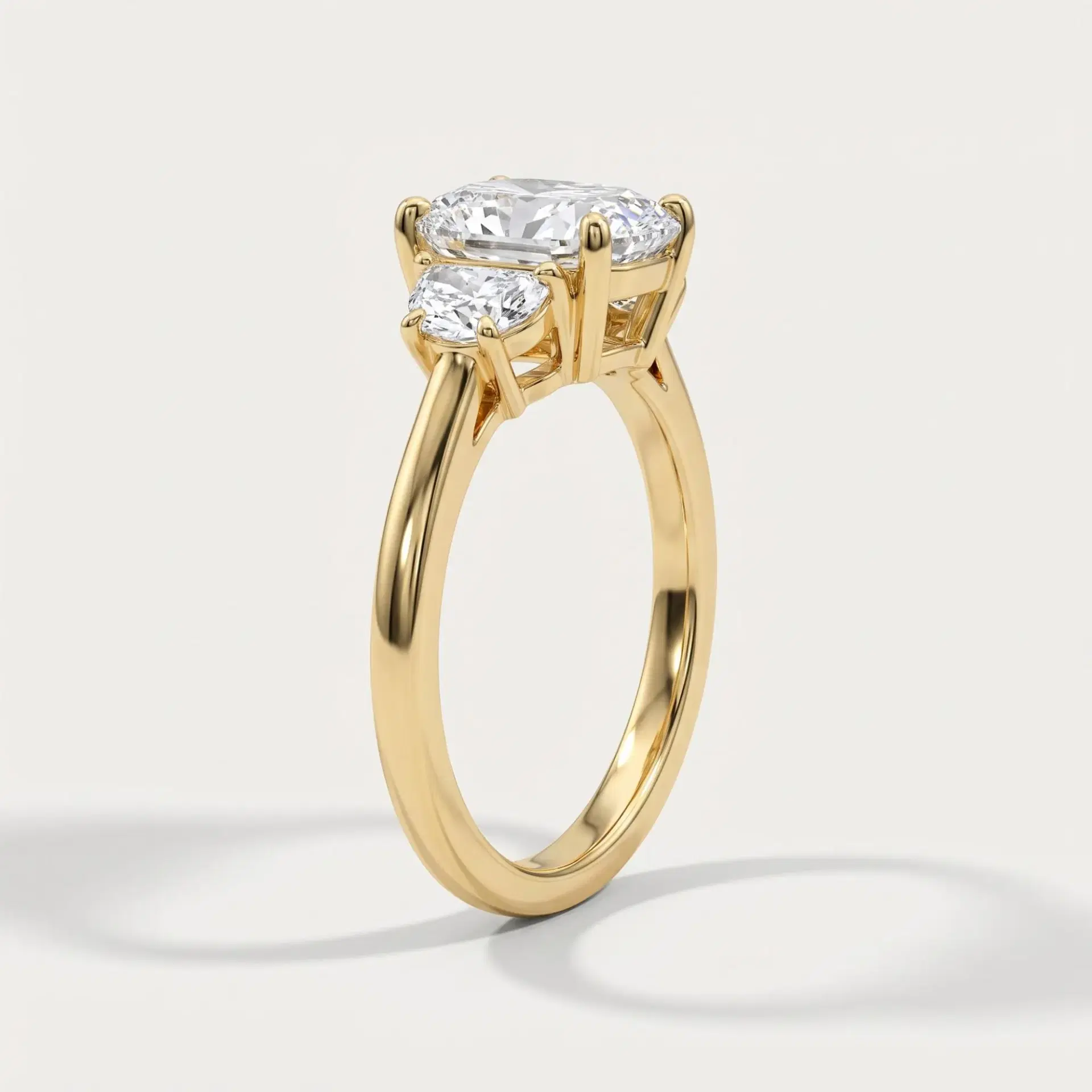 Elongated Cushion & Half Moon Diamond Three Stone Ring on model