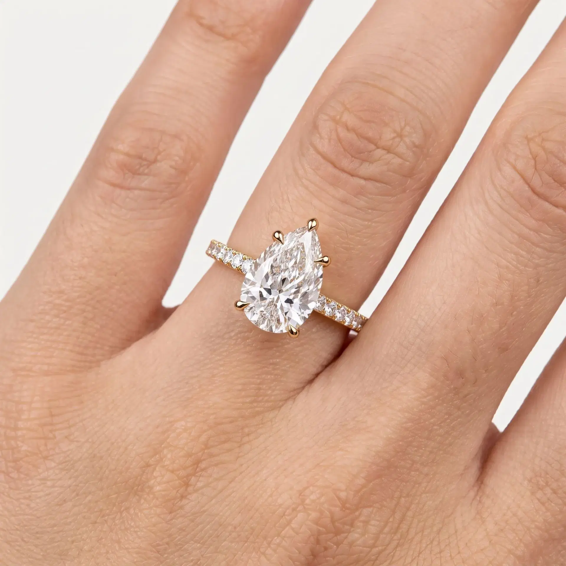 Pear Diamond Five Prong Ring with Pavé Band on model
