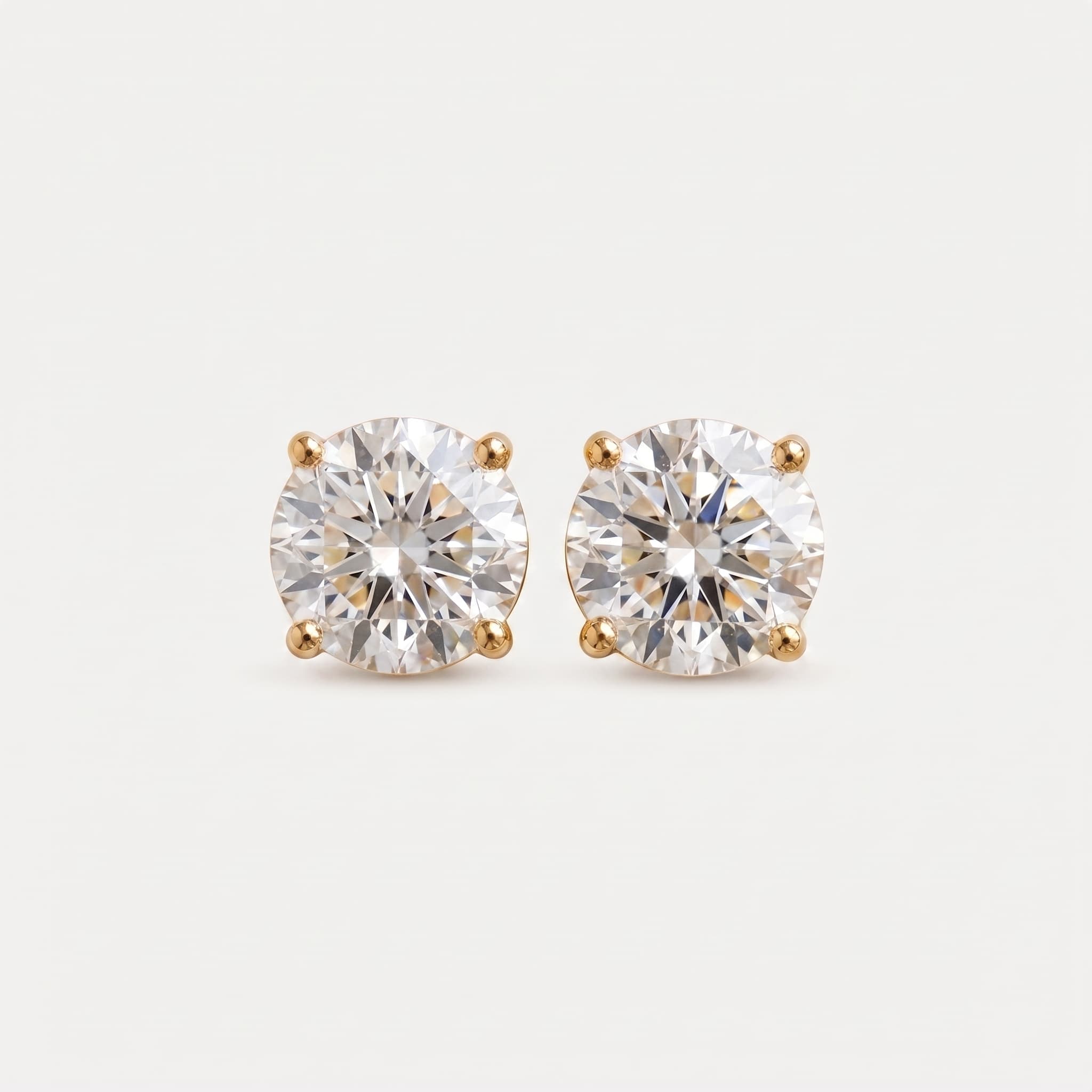 Facet & Flame — Portuguese Cut Diamond Solitaire Stud Earrings