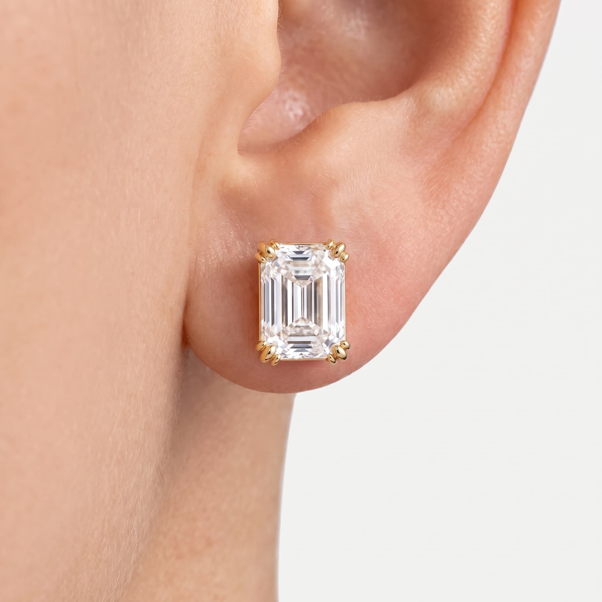 Clarity — Emerald Cut Diamond Threaded Stud Earrings on model
