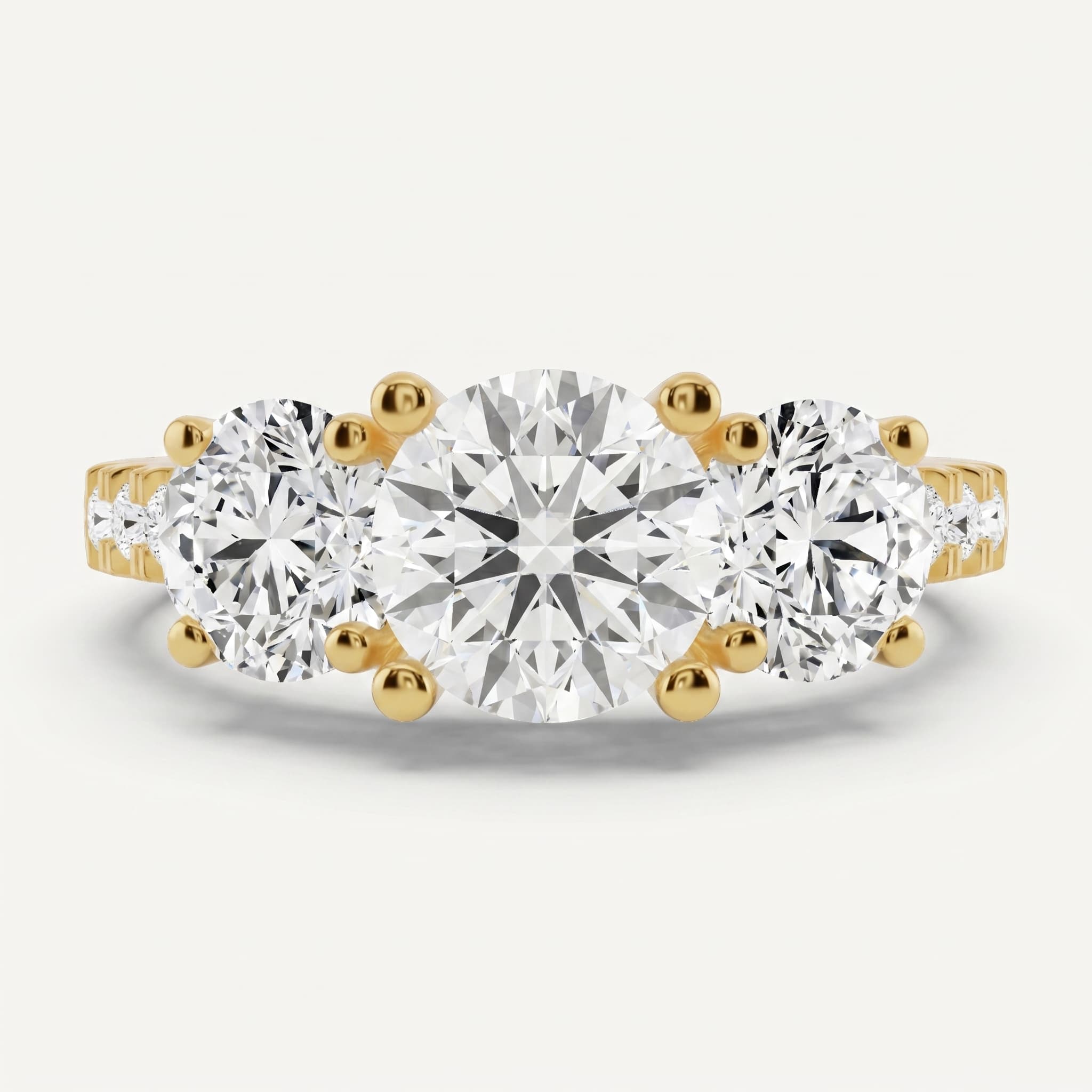 Side by Side — Round Three Stone Diamond Ring
