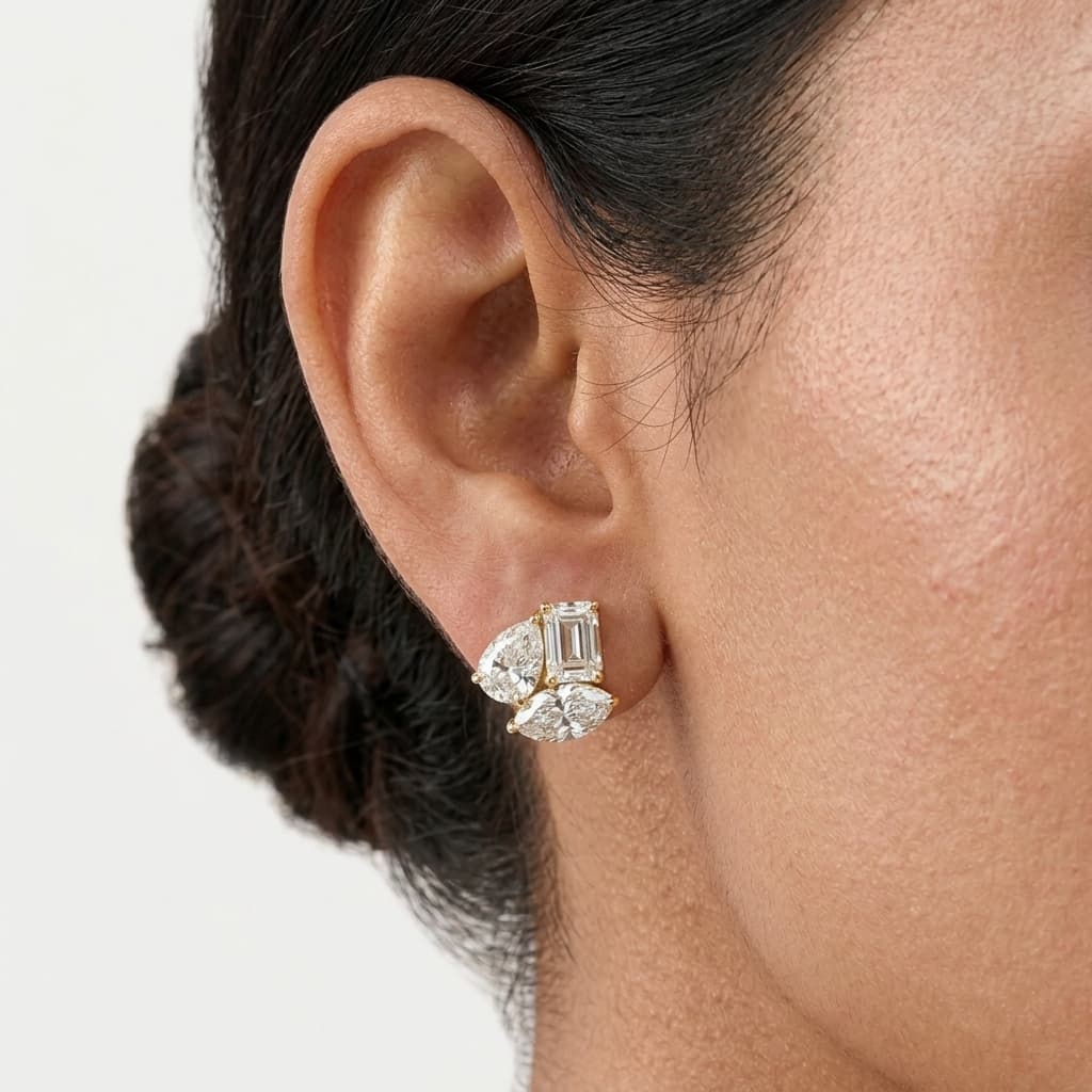 Fancy Mix — Emerald, Pear & Marquise Diamond Cluster Stud Earrings on model