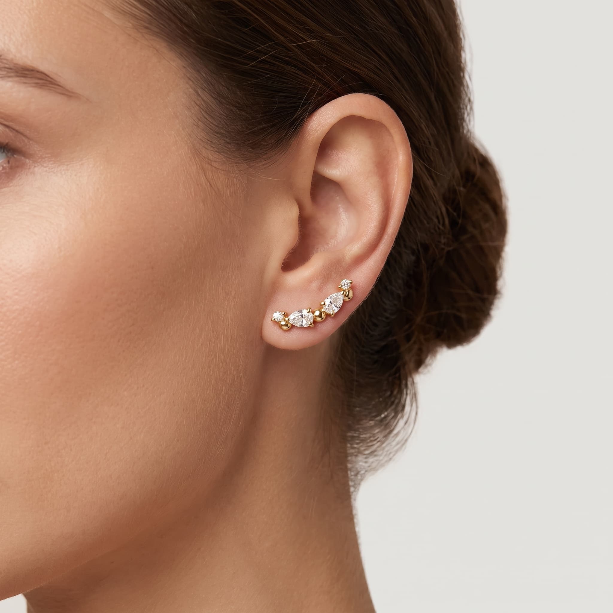 Contour Studs — Pear & Round Diamond Bar Stud Earrings on model