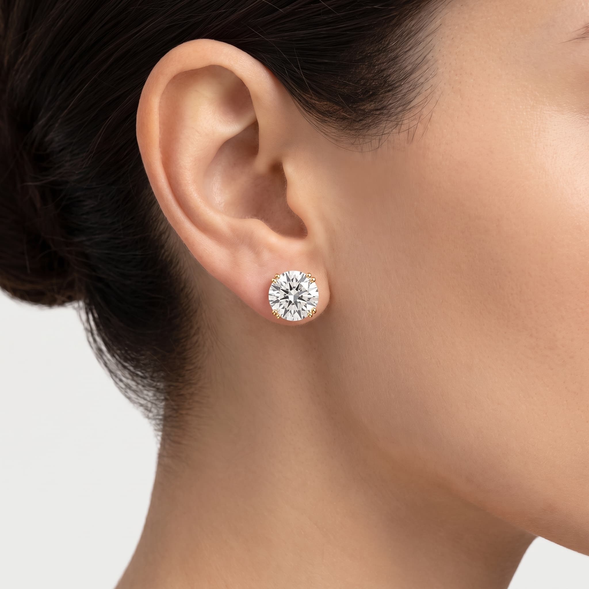 Solitaire Promise — Round Diamond Threaded Stud Earrings on model