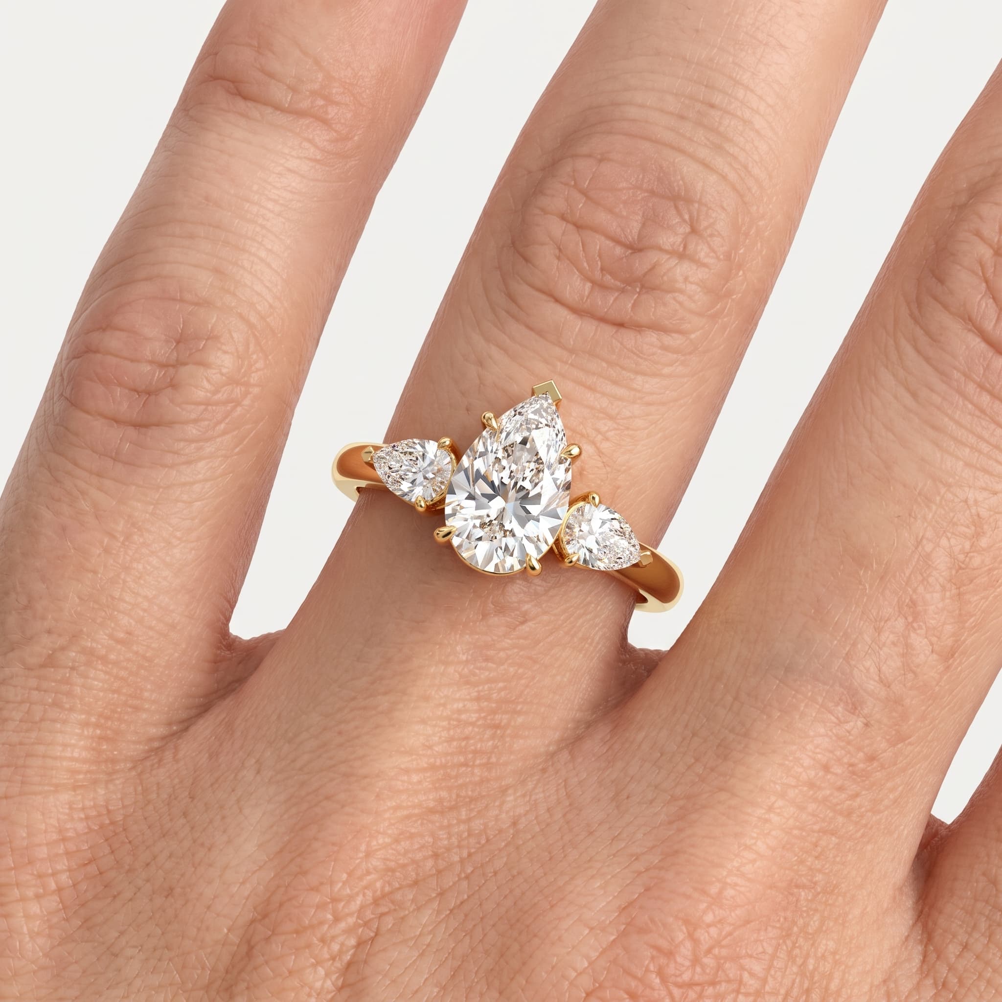 Whisperwing — Pear Diamond Three Stone Ring thumbnail 4