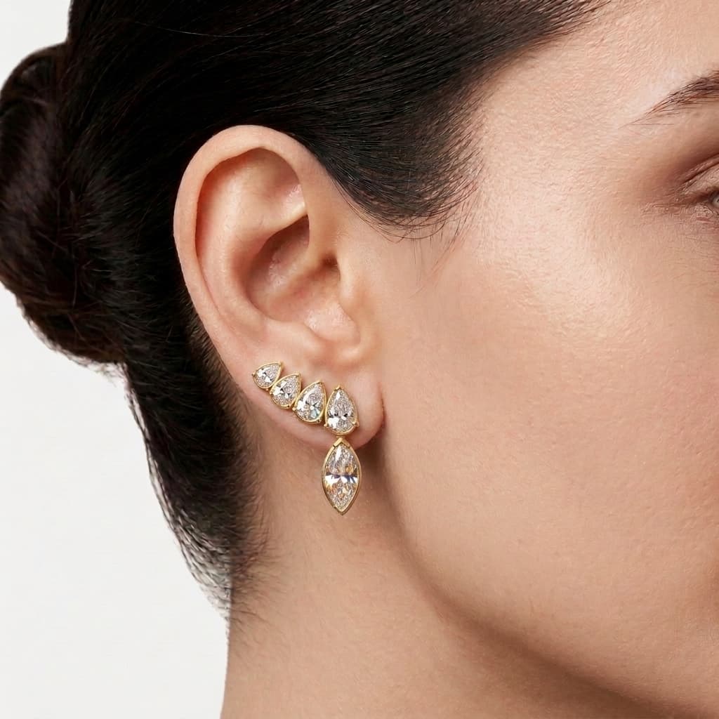 Skyline Ascent — Graduated Pear & Marquise Diamond Stud Earrings on model