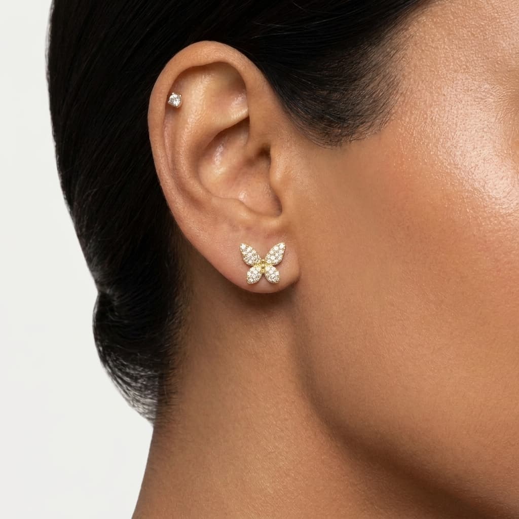 Flutterby — Pavé Diamond Butterfly Stud Earrings on model