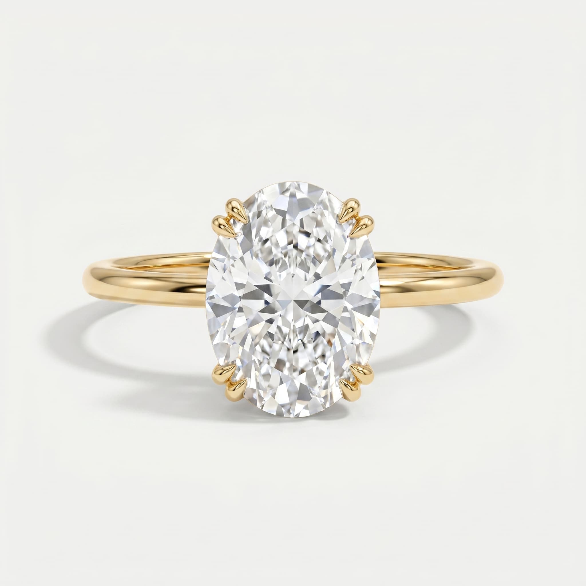 Held in Light — Oval Solitaire Diamond Ring