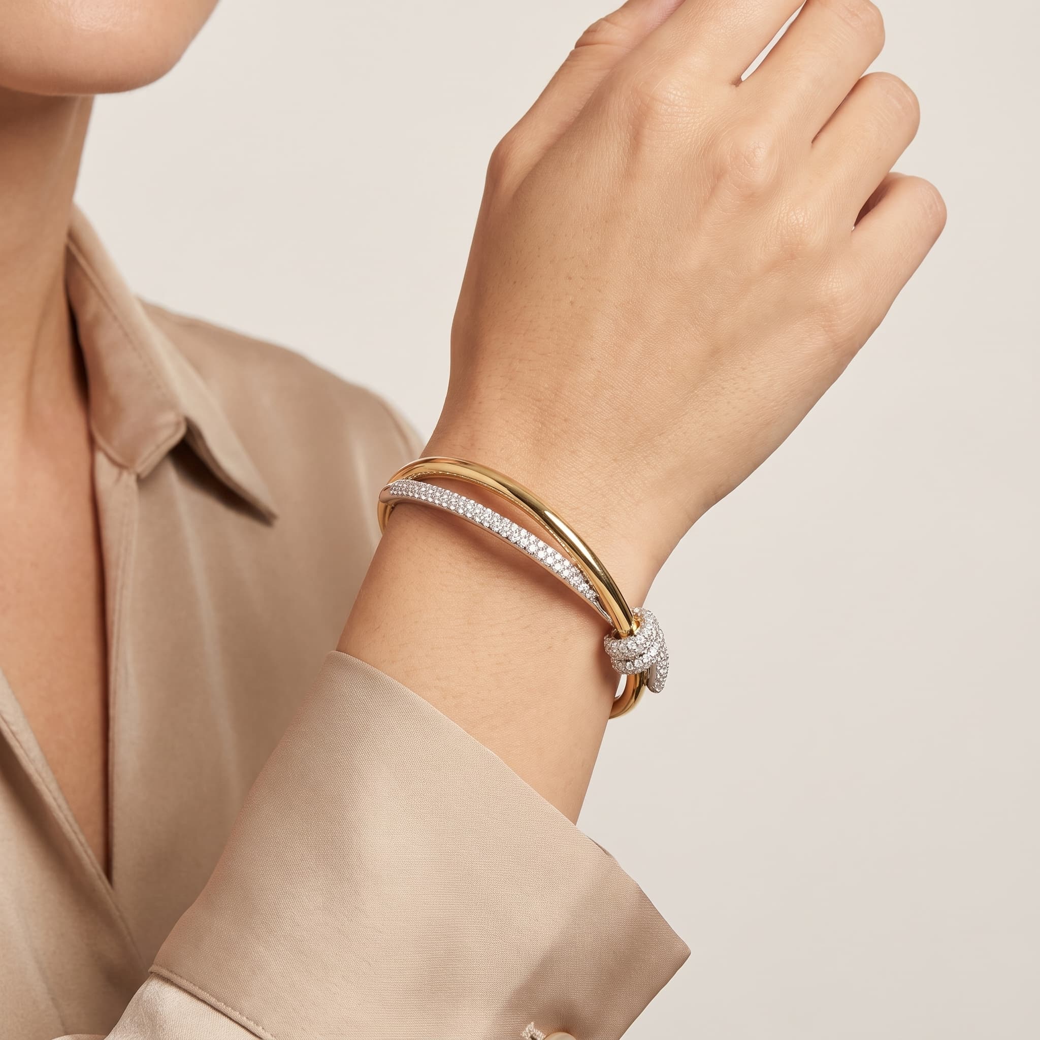 Eternal Knot — Round Diamond Pavé Open Cuff Bangle on model