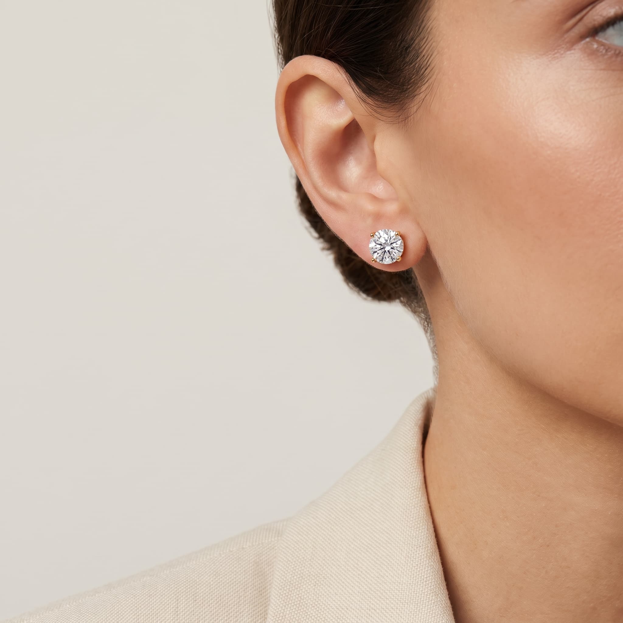 Facet & Flame — Portuguese Cut Diamond Solitaire Stud Earrings on model