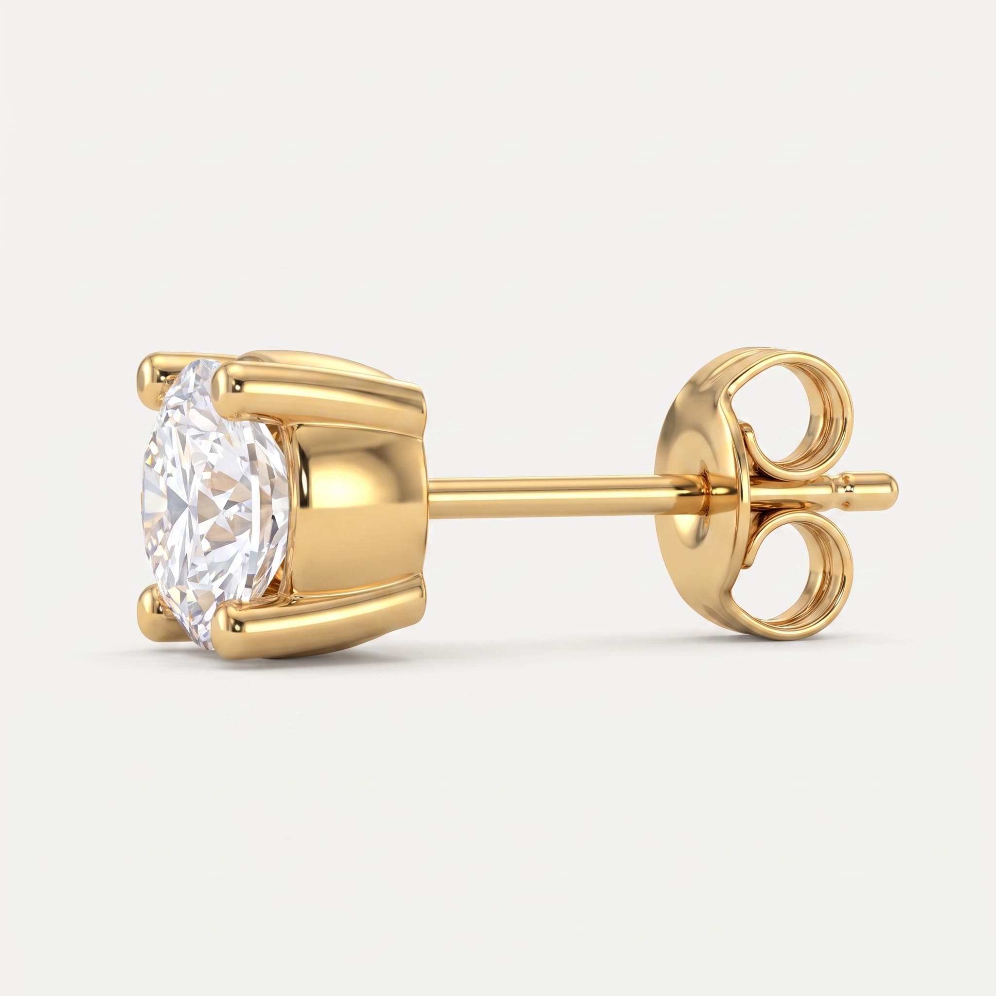 Classic Four — Round Diamond Stud Earrings on model
