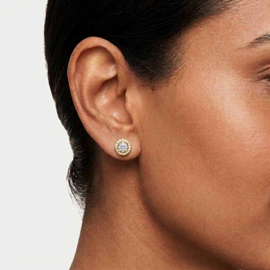Halo Radiance — Round Diamond Halo Stud Earrings on model
