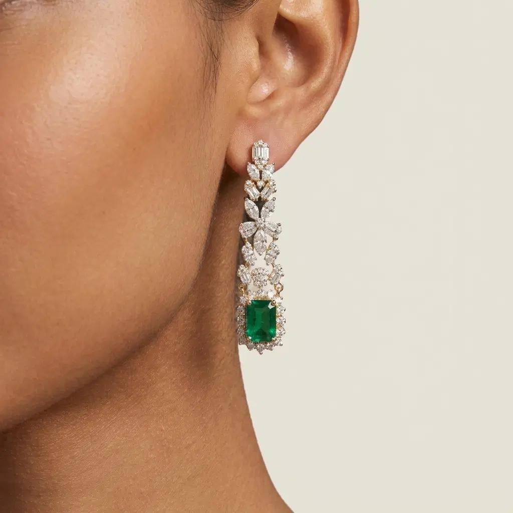 White Diamond & Emerald Cascade Drop Earrings on model