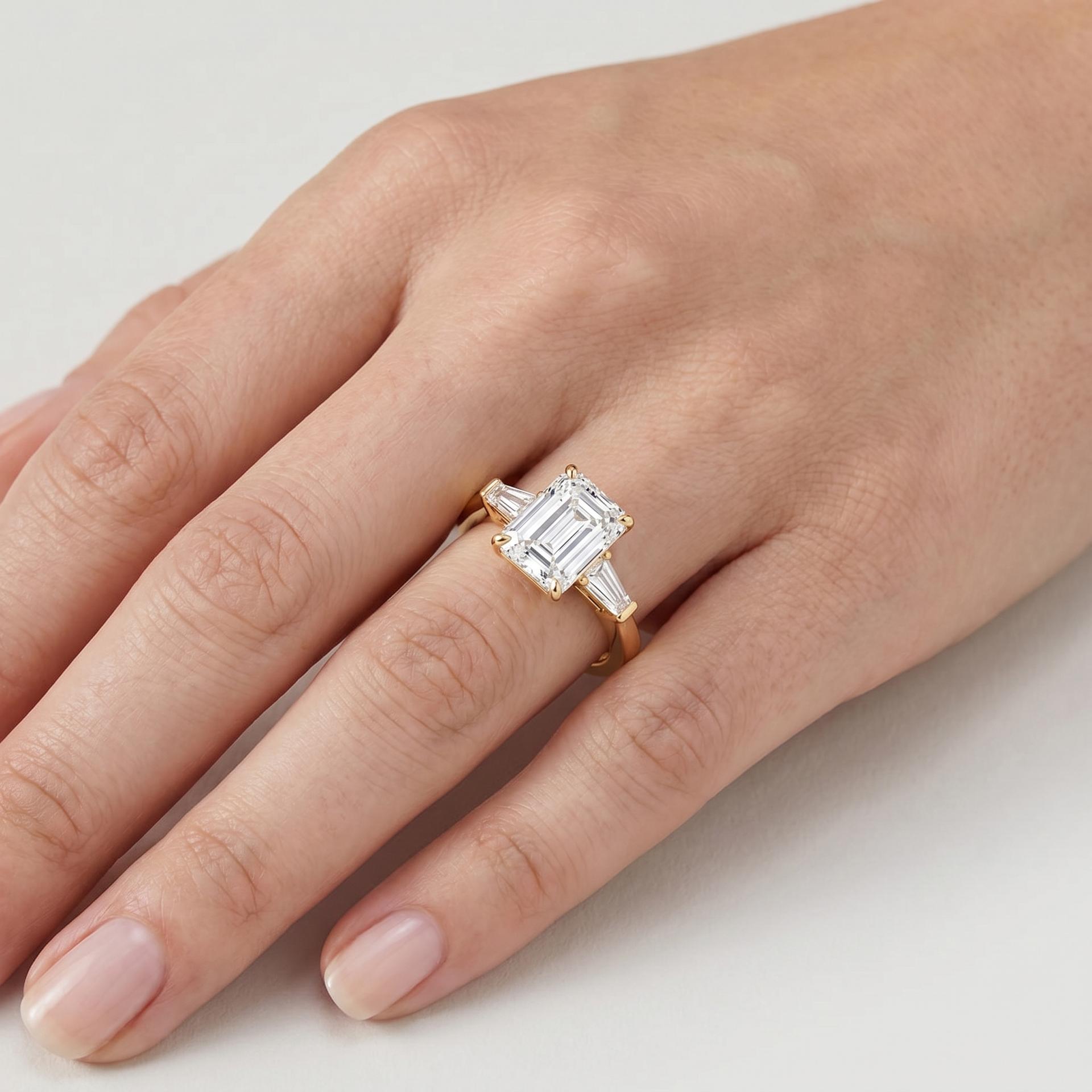 Emerald Three Stone Ring on model
