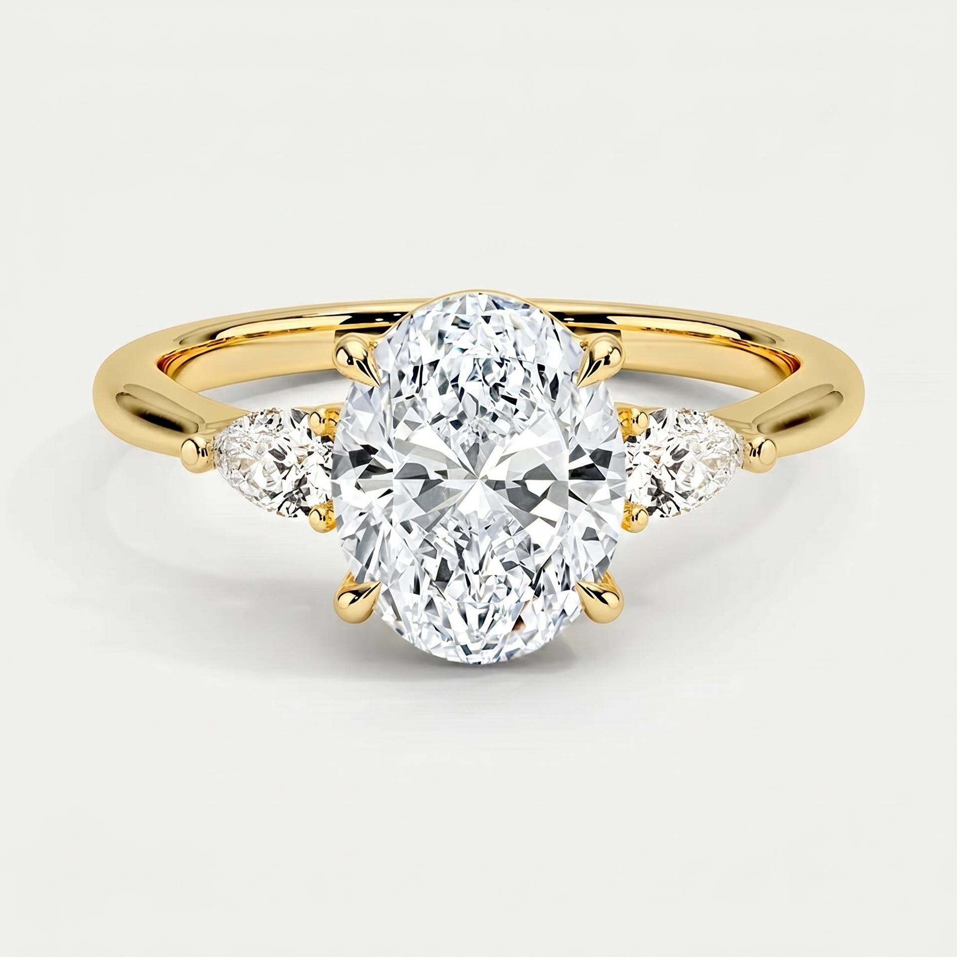 Oval Pear Three Stone Ring