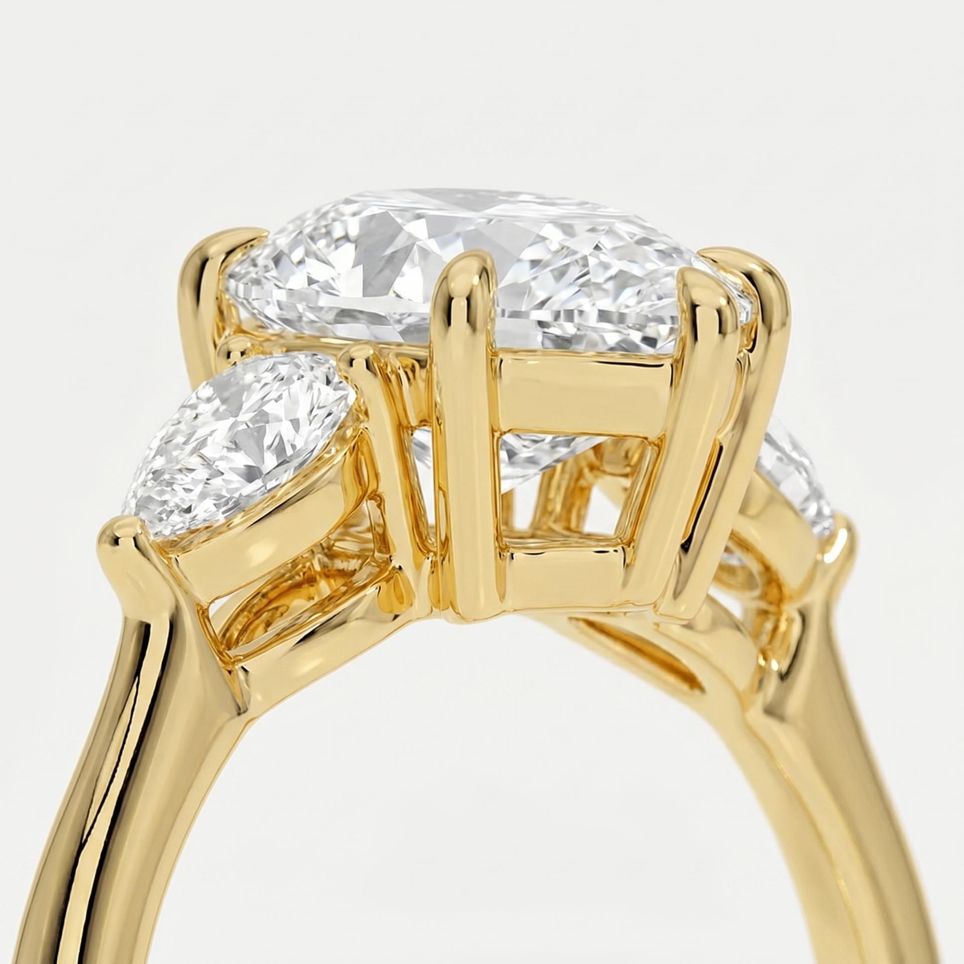 Pear Three Stone Ring on model