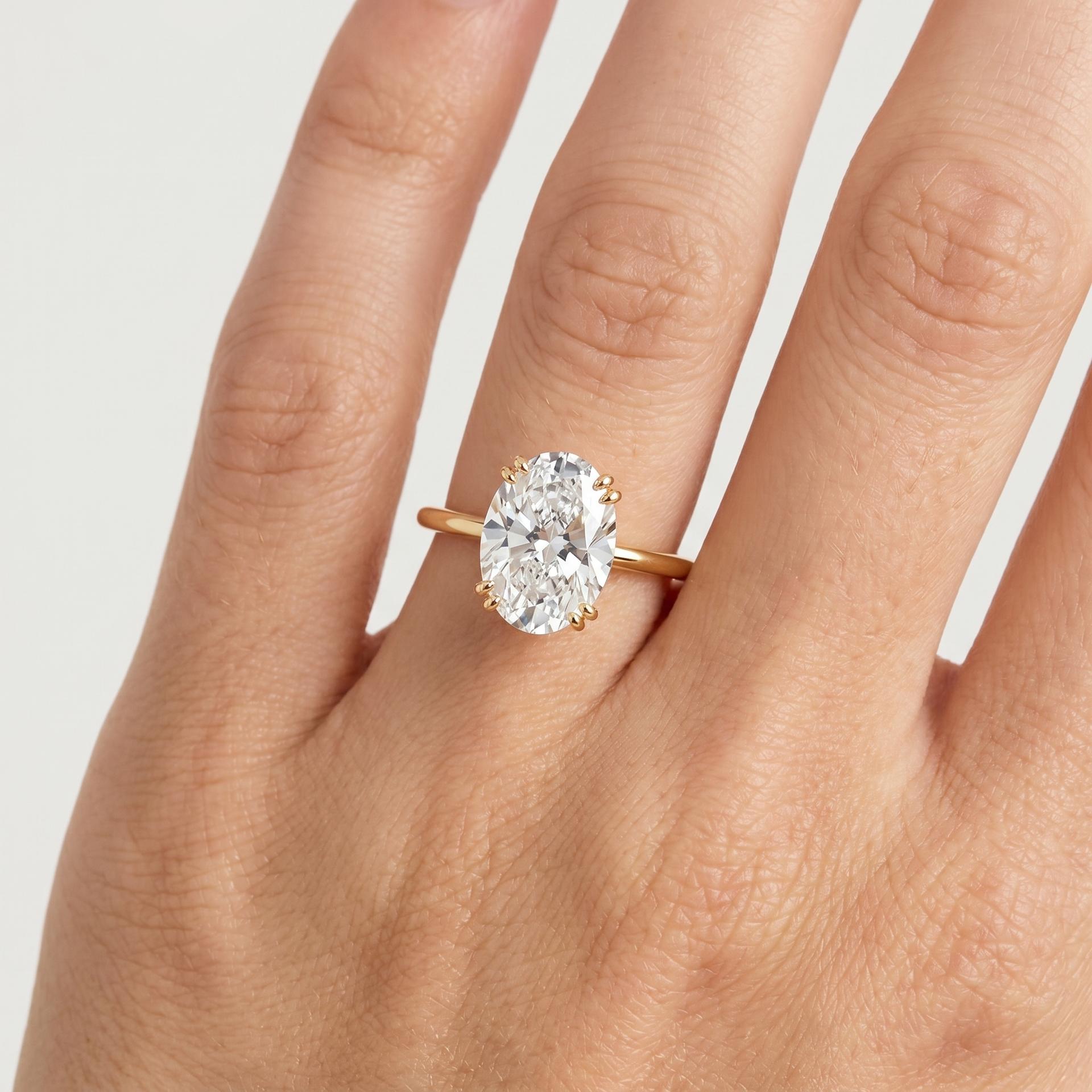 Oval Solitaire Diamond Ring on model