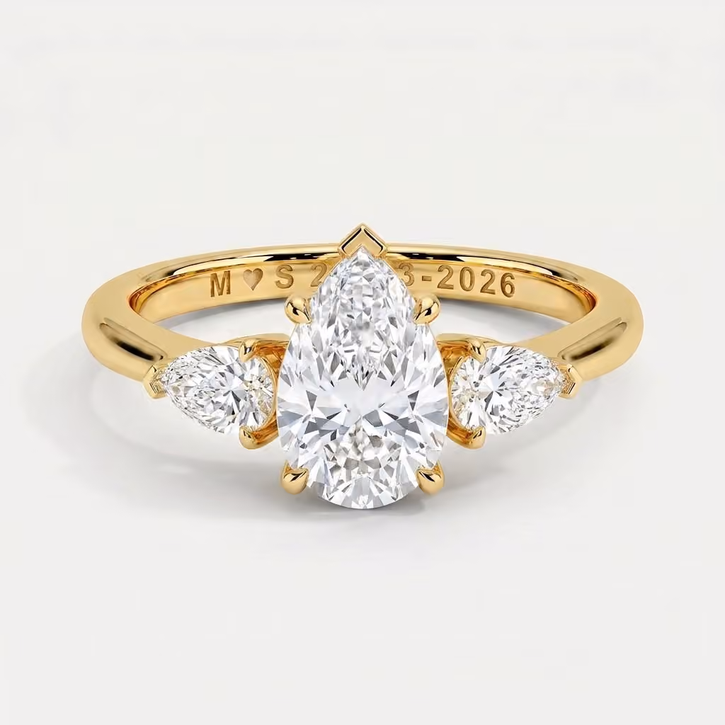 Pear Diamond Three Stone Ring