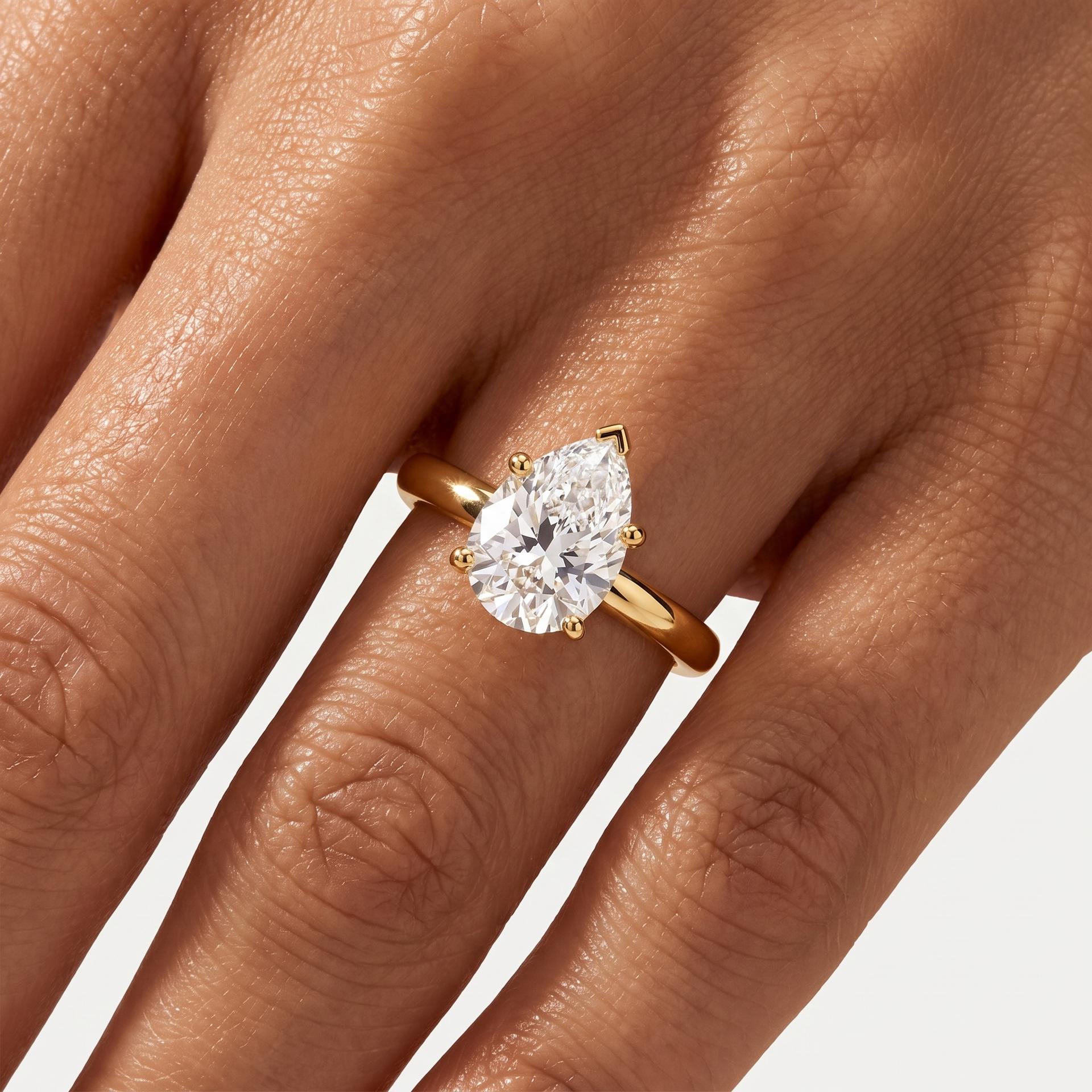 Pear Diamond Solitaire Ring on model