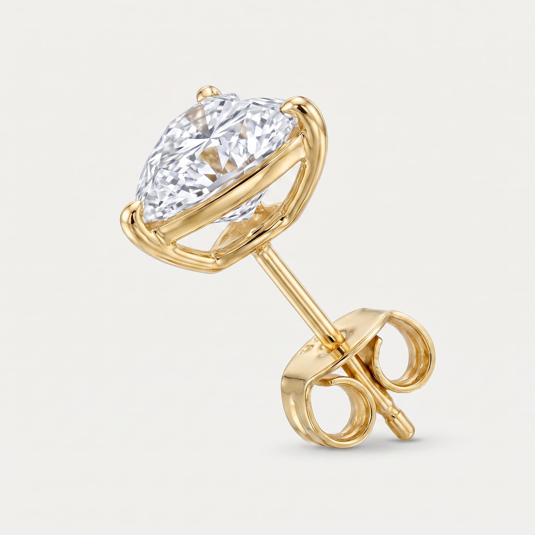 Two Hearts As One — Heart Diamond Solitaire Stud Earrings on model