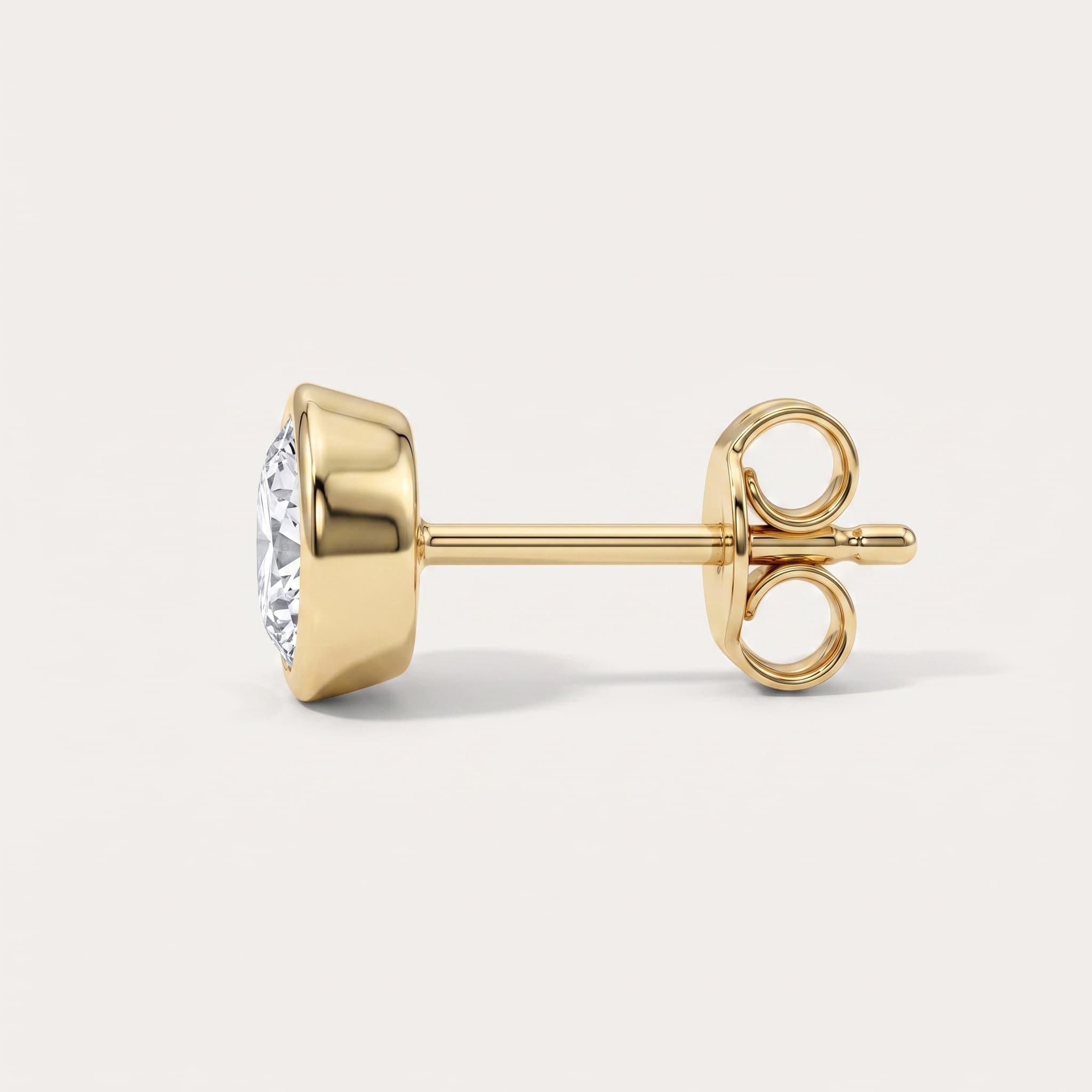 Halo of Us — Round Diamond Bezel Stud Earrings on model