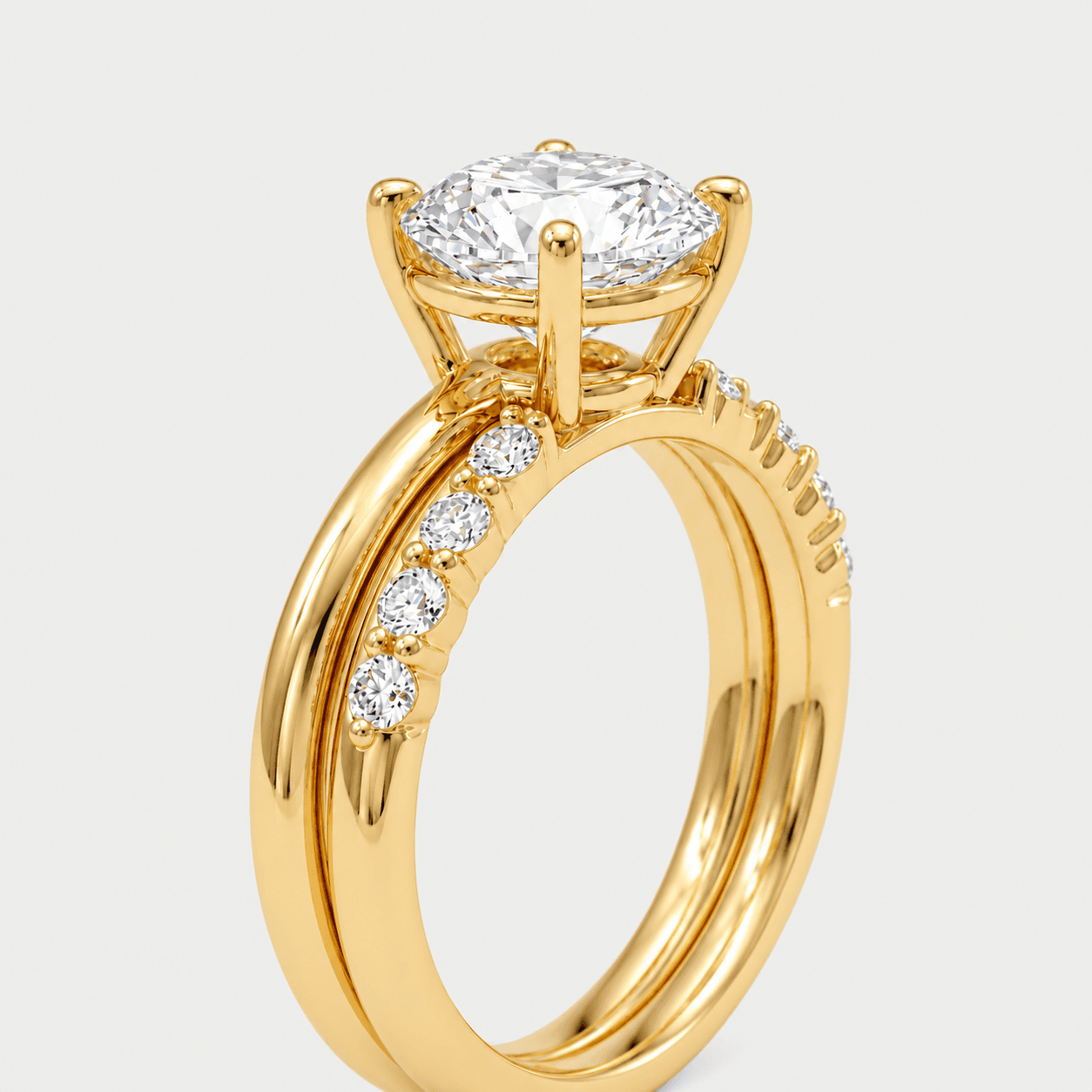 Twin Vow — Round Diamond Solitaire with Pavé Double Shank on model