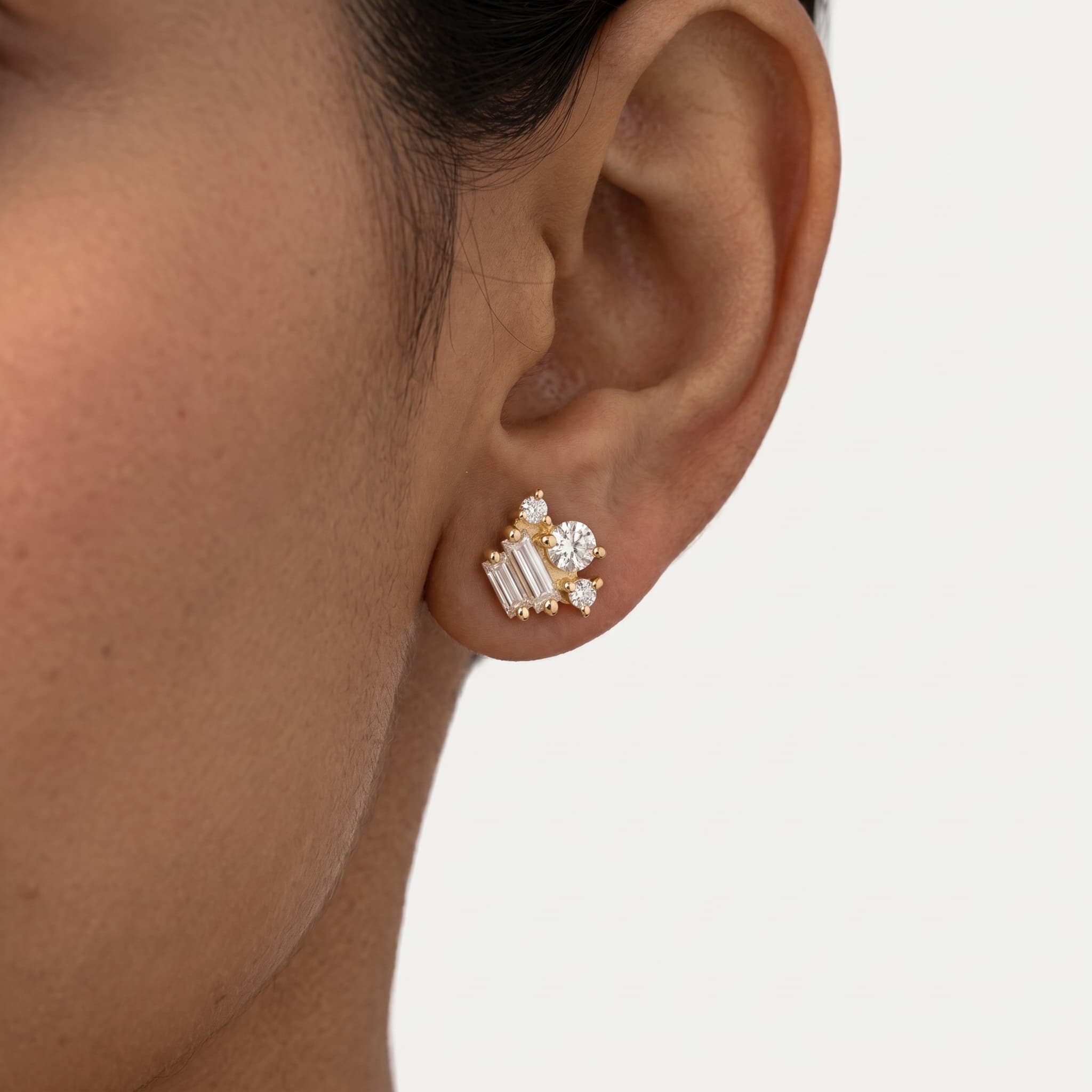 Cascade — Baguette & Round Diamond Mix Cluster Stud Earrings on model