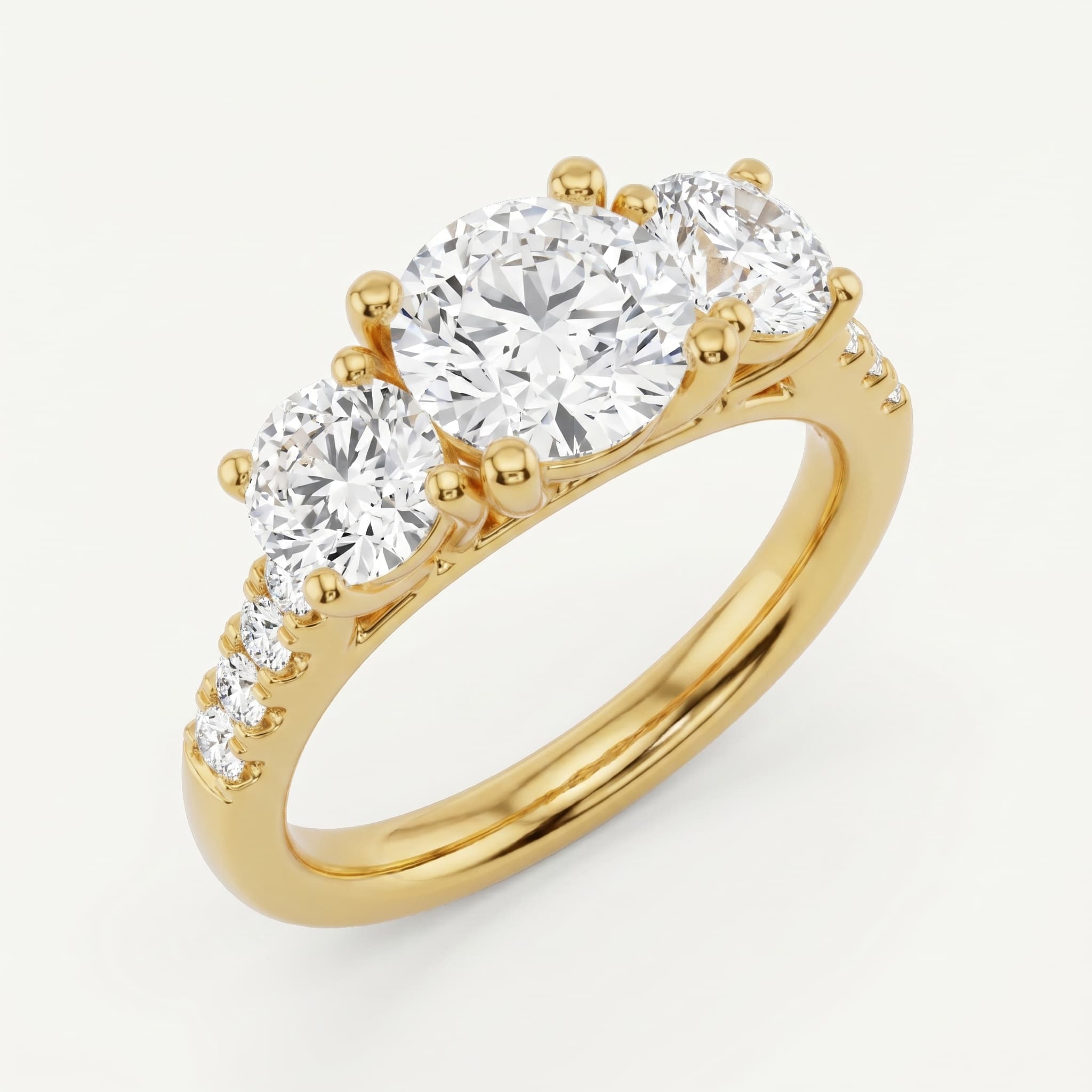Side by Side — Round Three Stone Diamond Ring on model