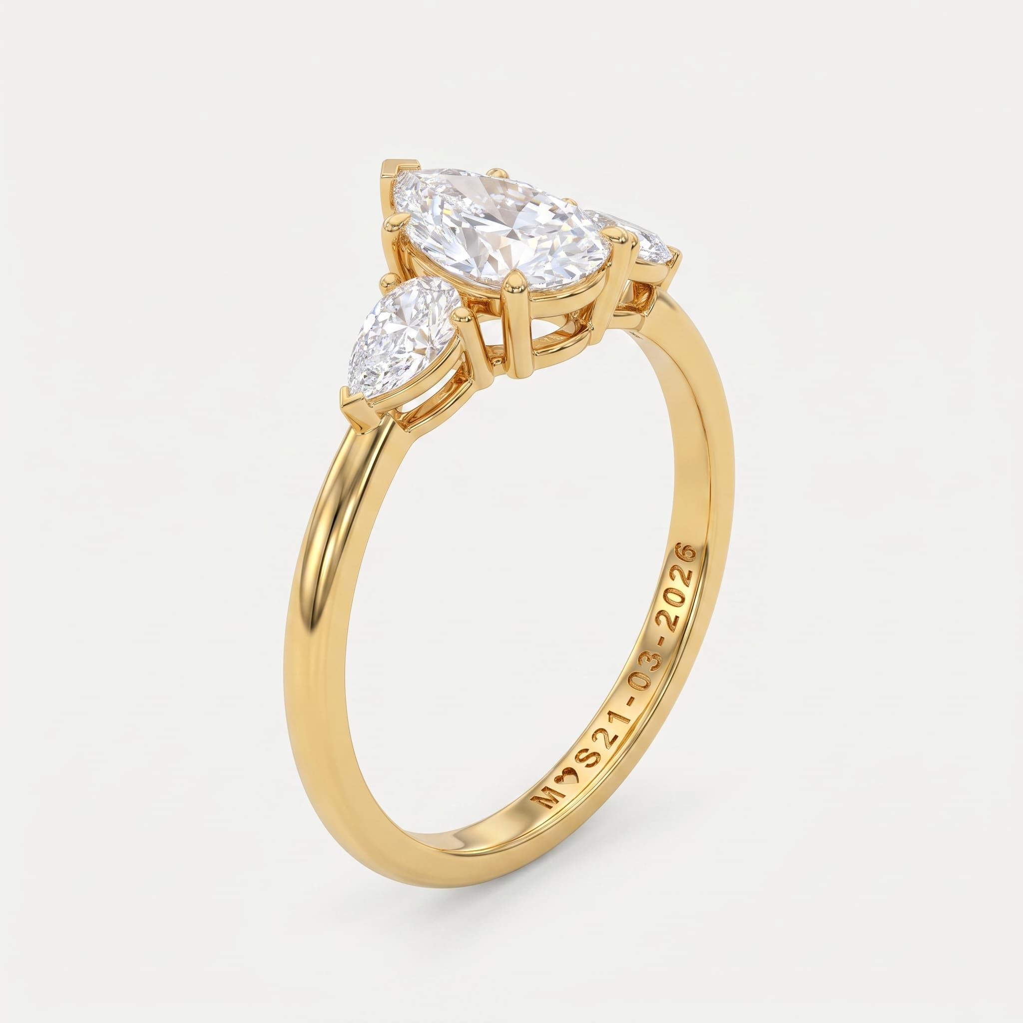 Whisperwing — Pear Diamond Three Stone Ring on model