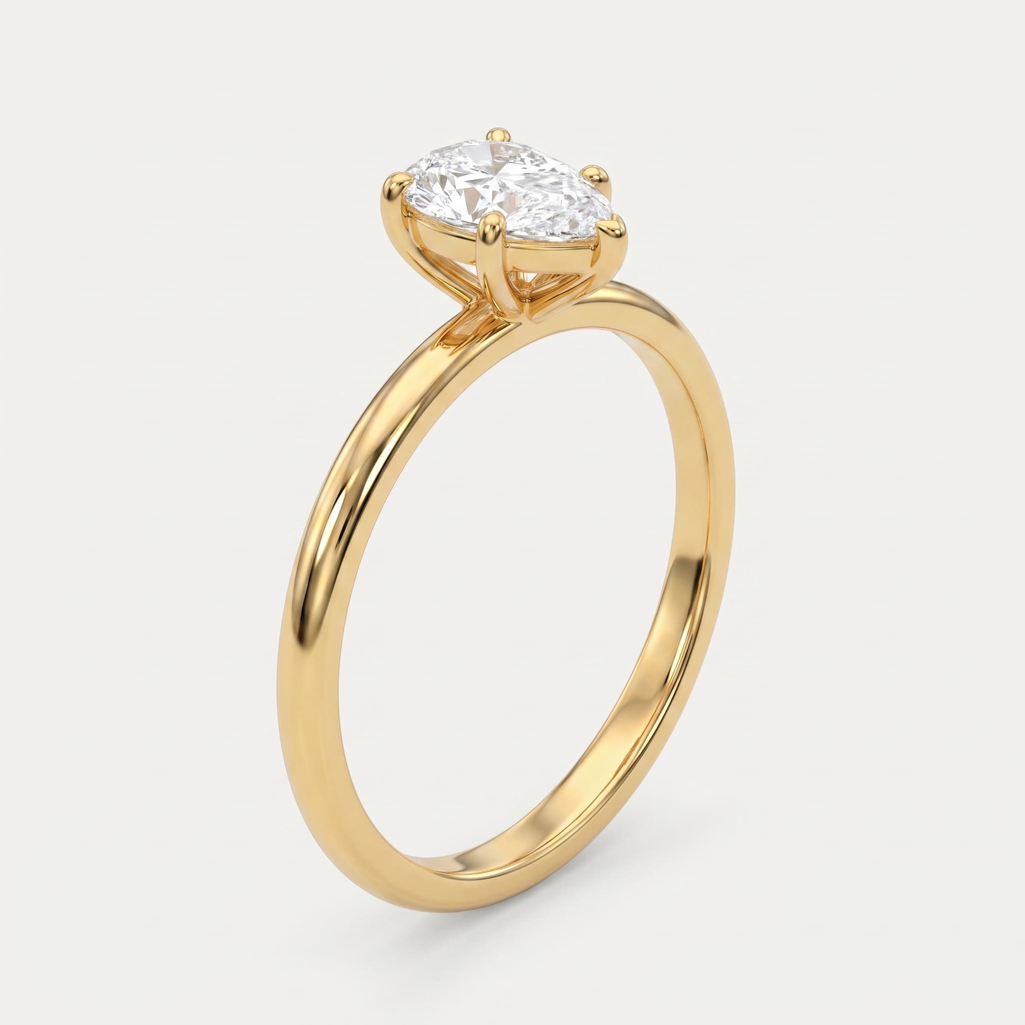 Teardrop Promise — Pear Diamond Solitaire Ring on model