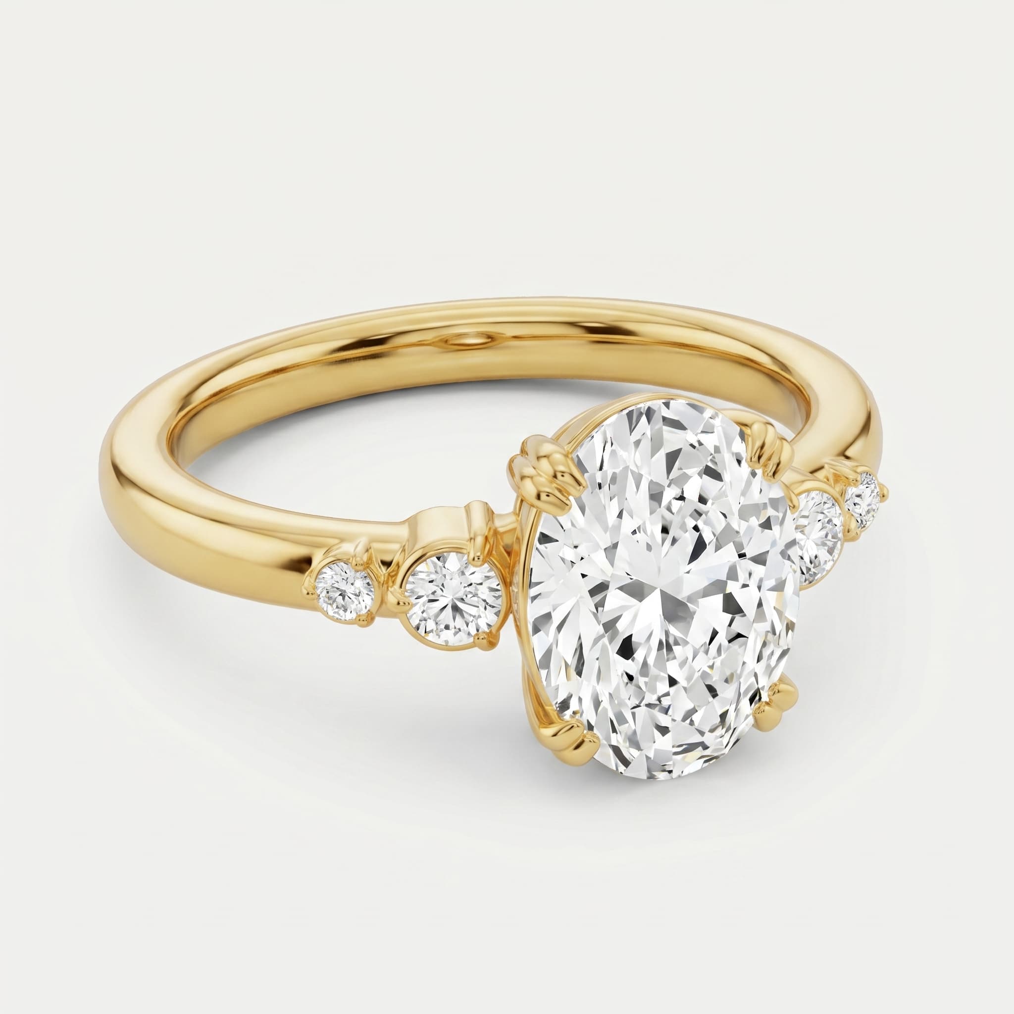 Quiet Company — Oval Diamond Side Stone Ring on model