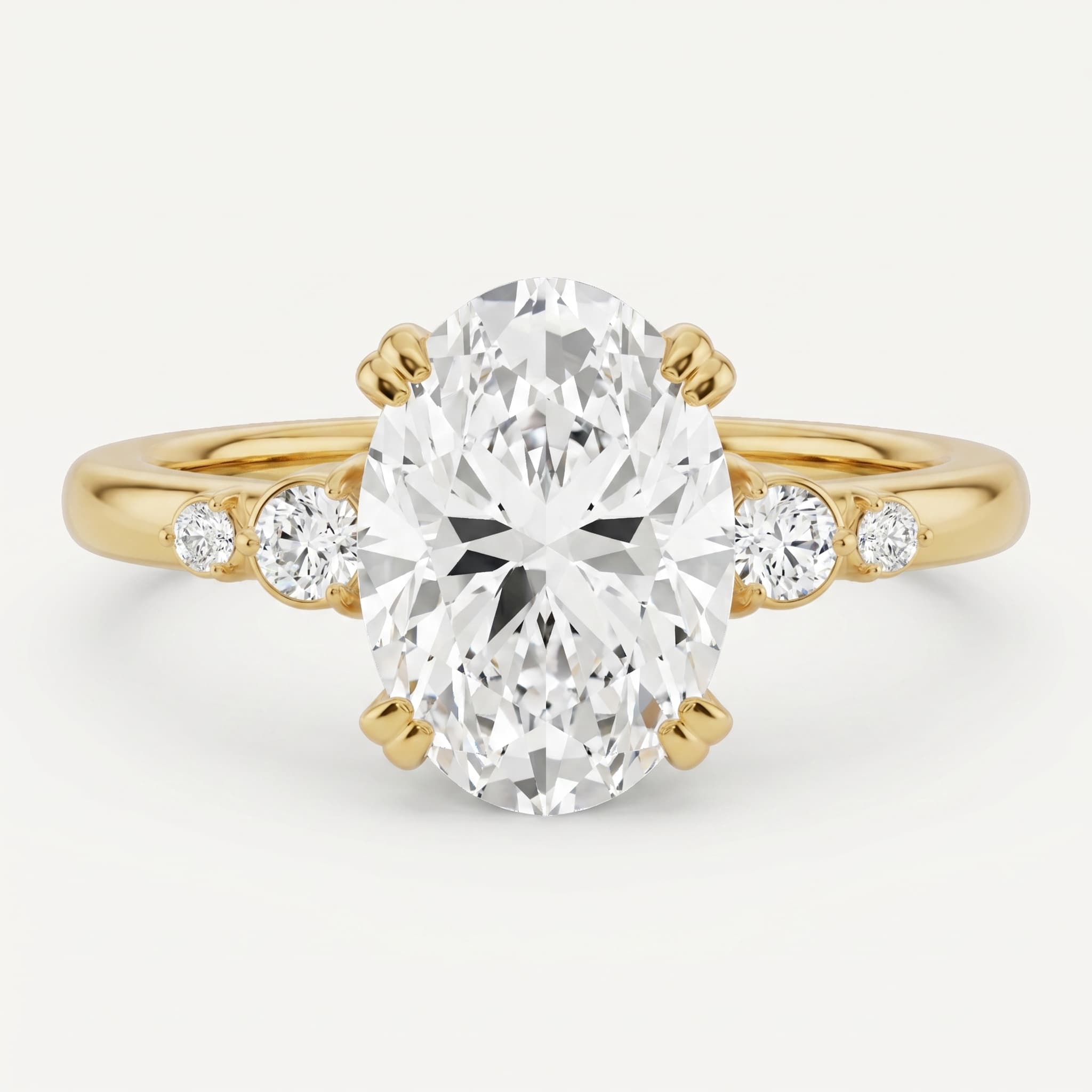 Quiet Company — Oval Diamond Side Stone Ring