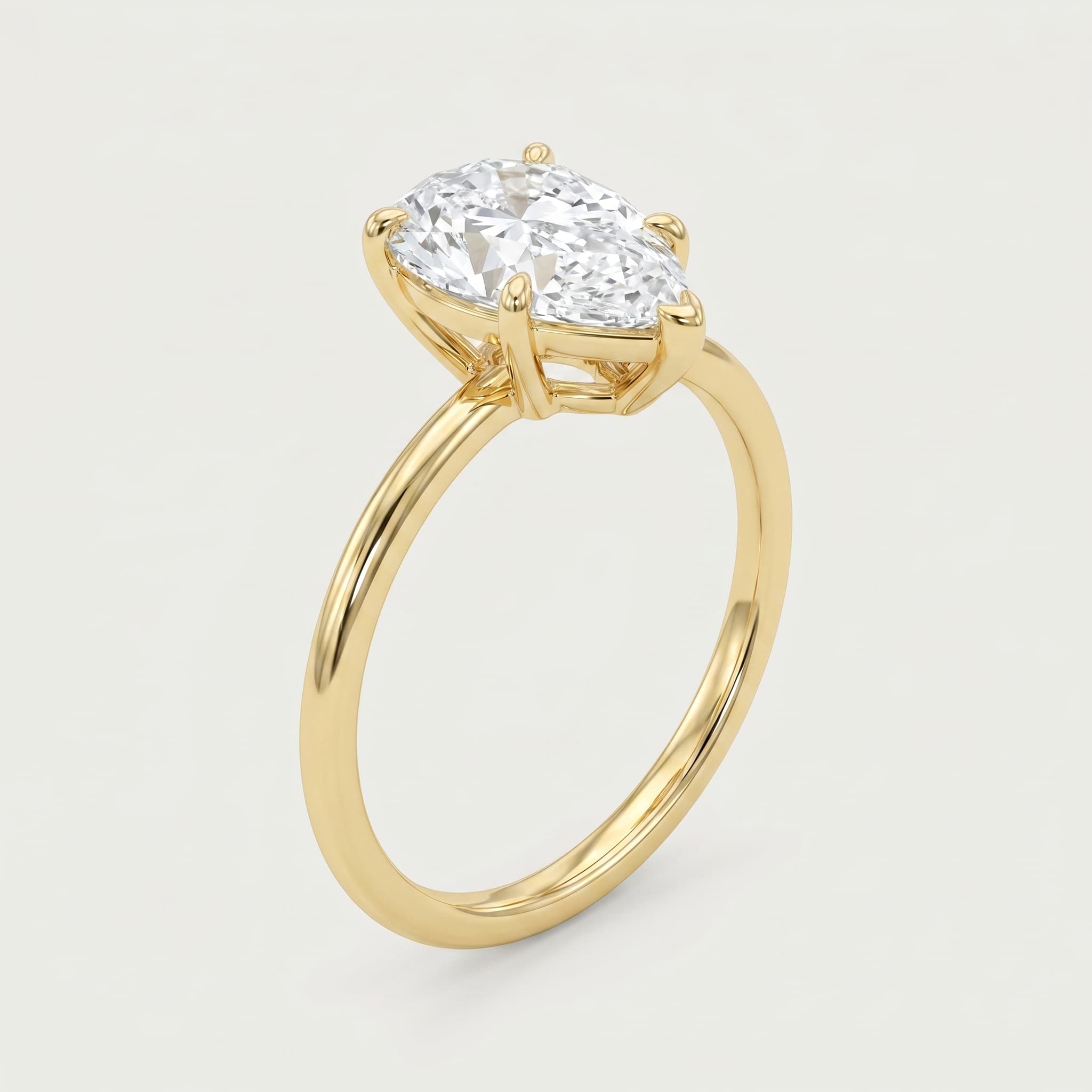Evermore — Pear Solitaire Diamond Ring on model