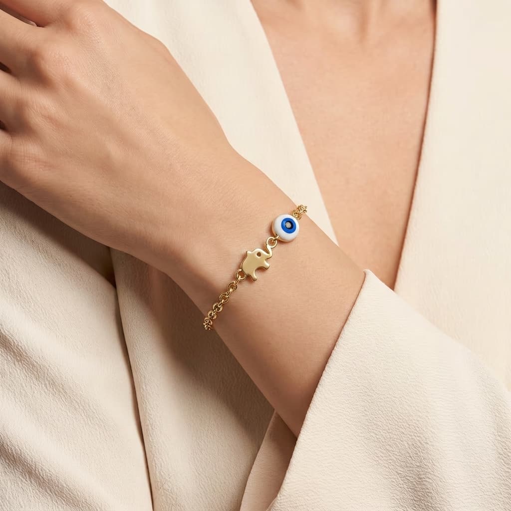 Lucky Wanderer — Elephant & Evil Eye Charm Bracelet on model