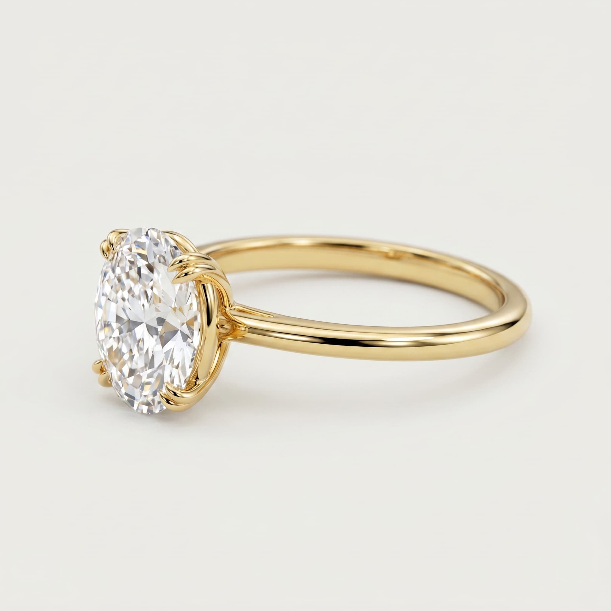 Held in Light — Oval Solitaire Diamond Ring on model